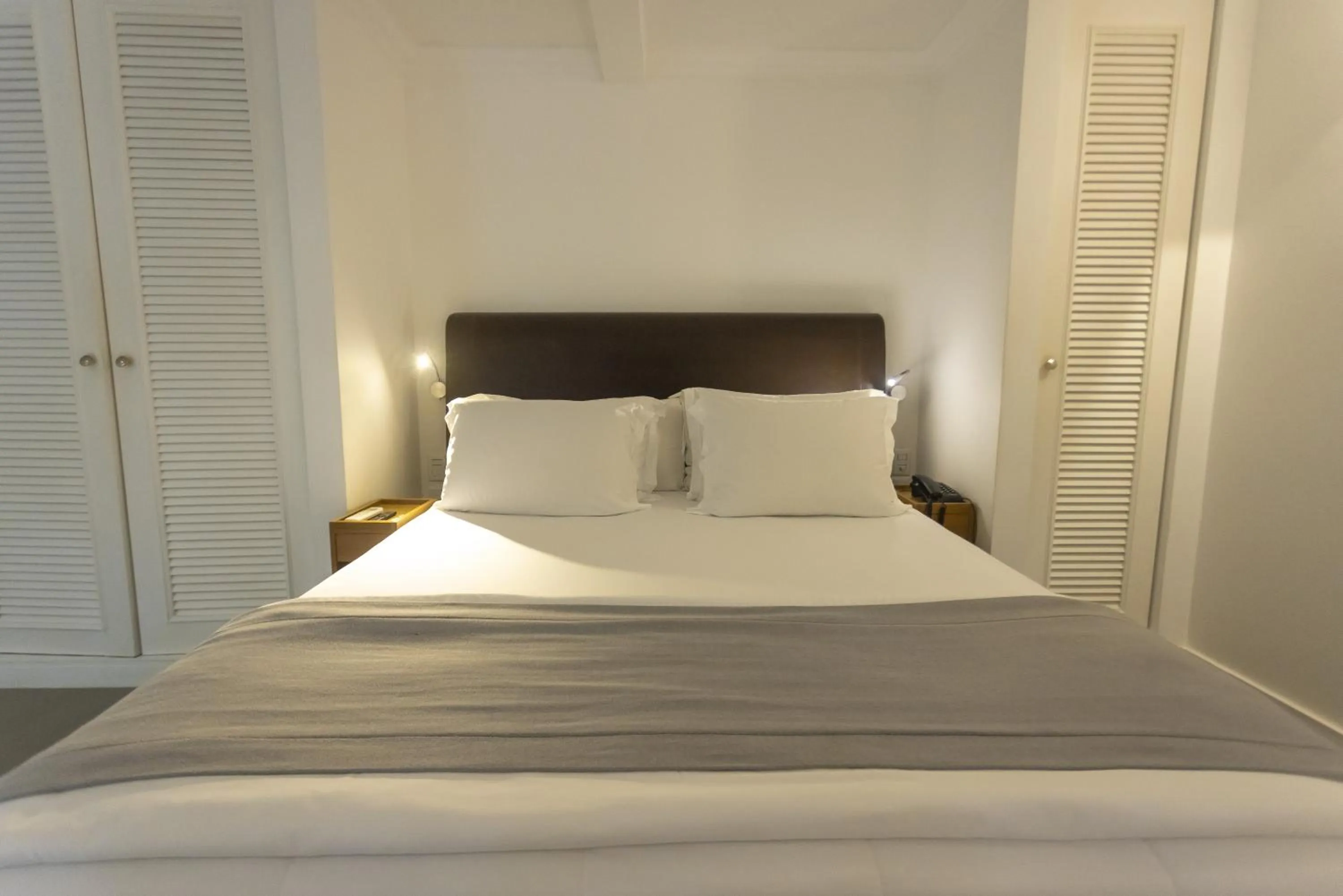 Bed in Felissimo Exclusive Hotel