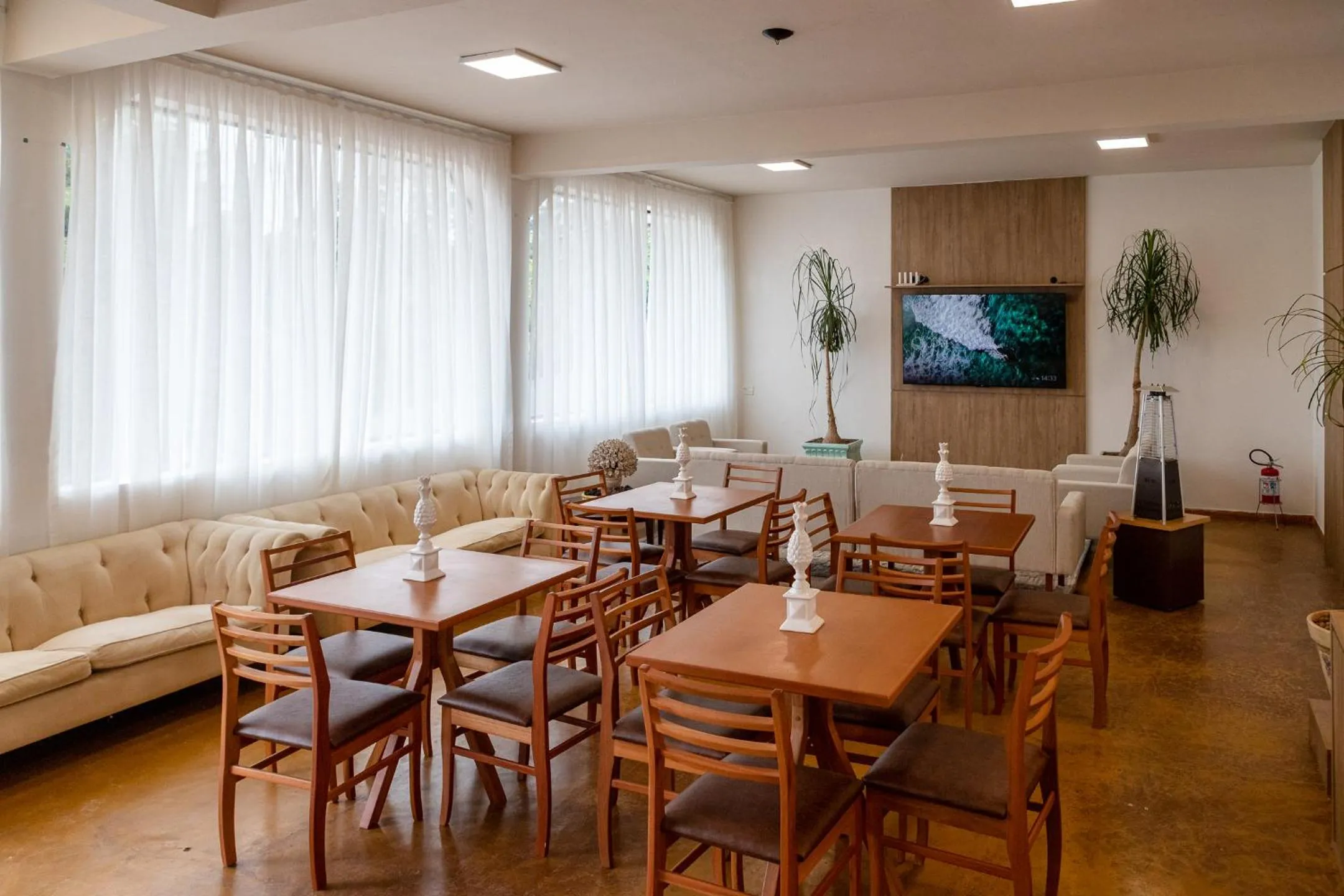 Communal lounge/ TV room in Pousada de Charme Vila Natal