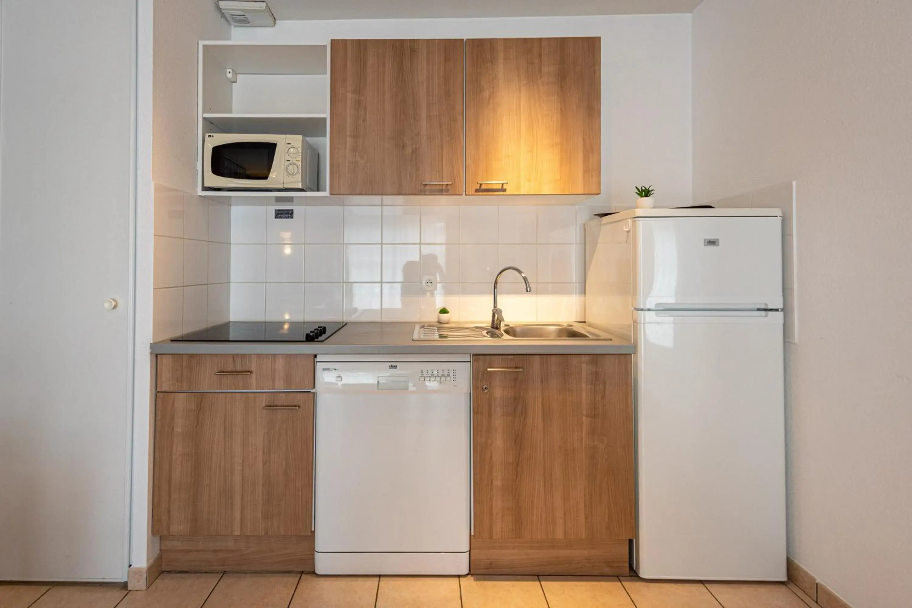 Kitchen or kitchenette in Terres de France - Le Domaine Du Golf Kitchen or kitchenette in Terres de France - Le Domaine Du Golf