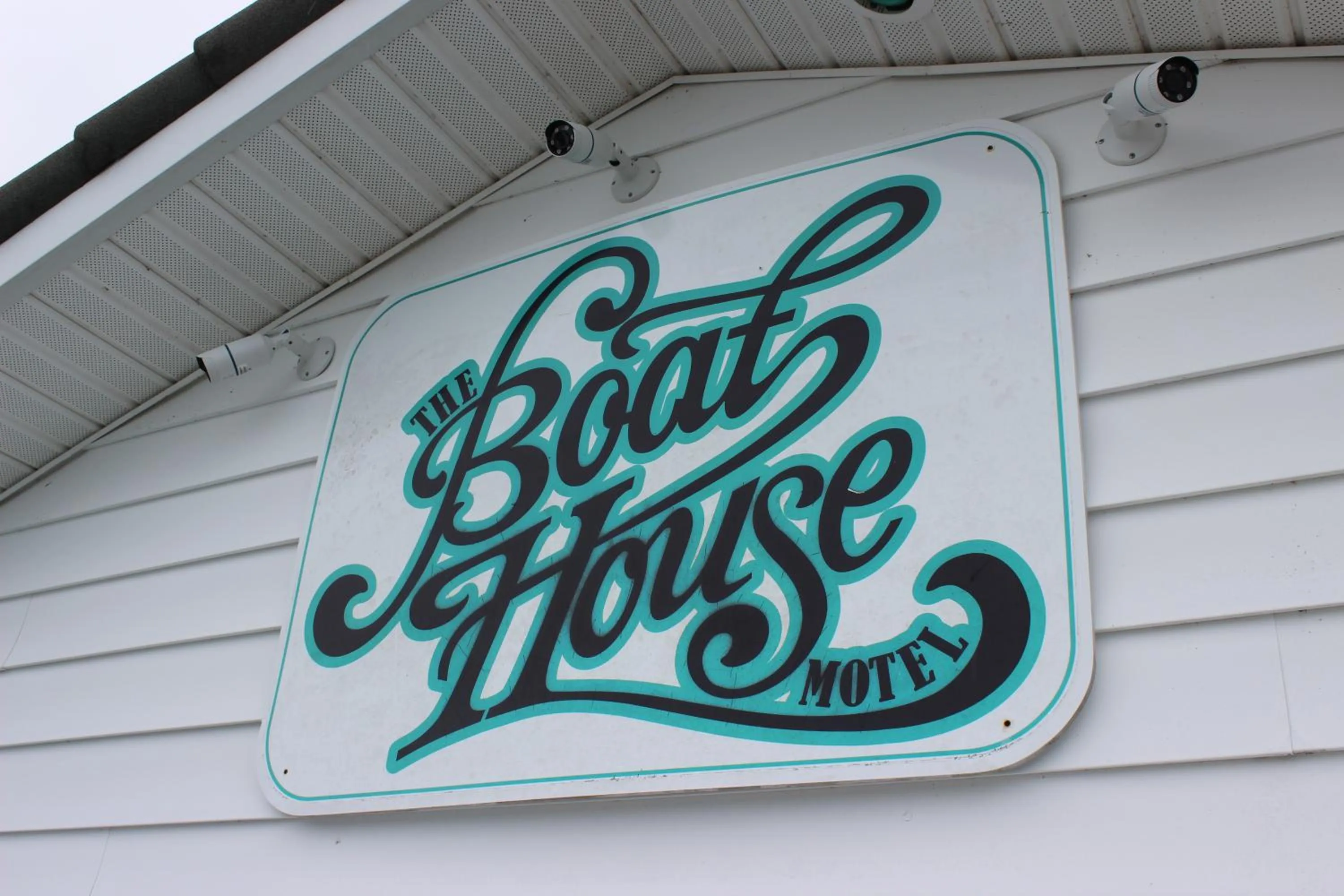 Property logo or sign in The BoatHouse