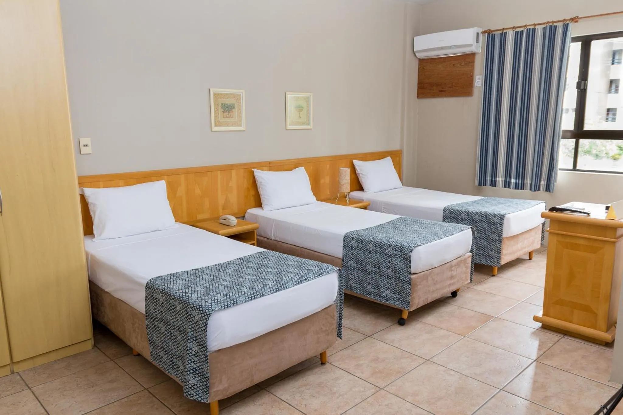 Bed in Maria Quitéria Hotel & Flat