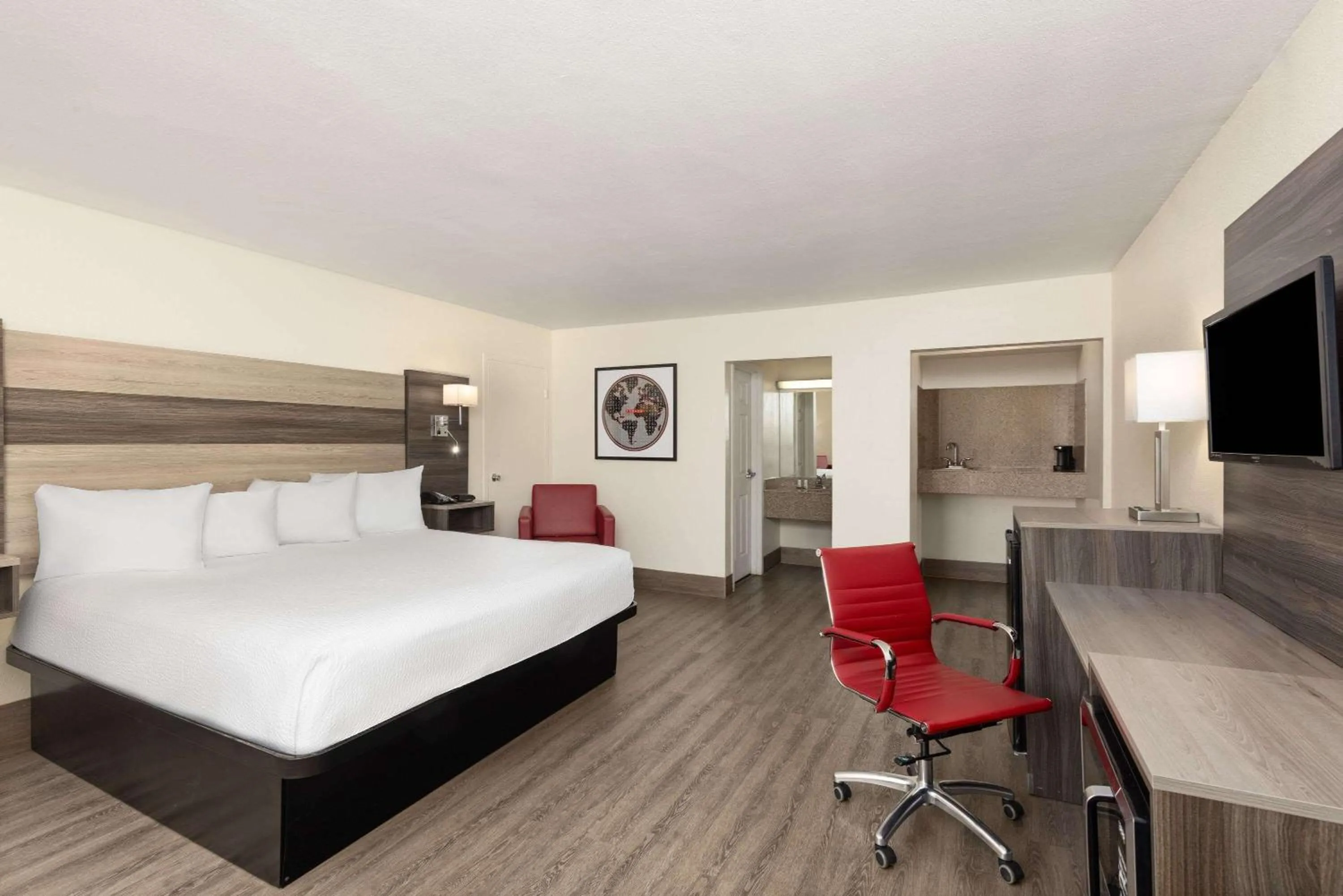 Photo of the whole room, Bed in Ramada by Wyndham Kingman