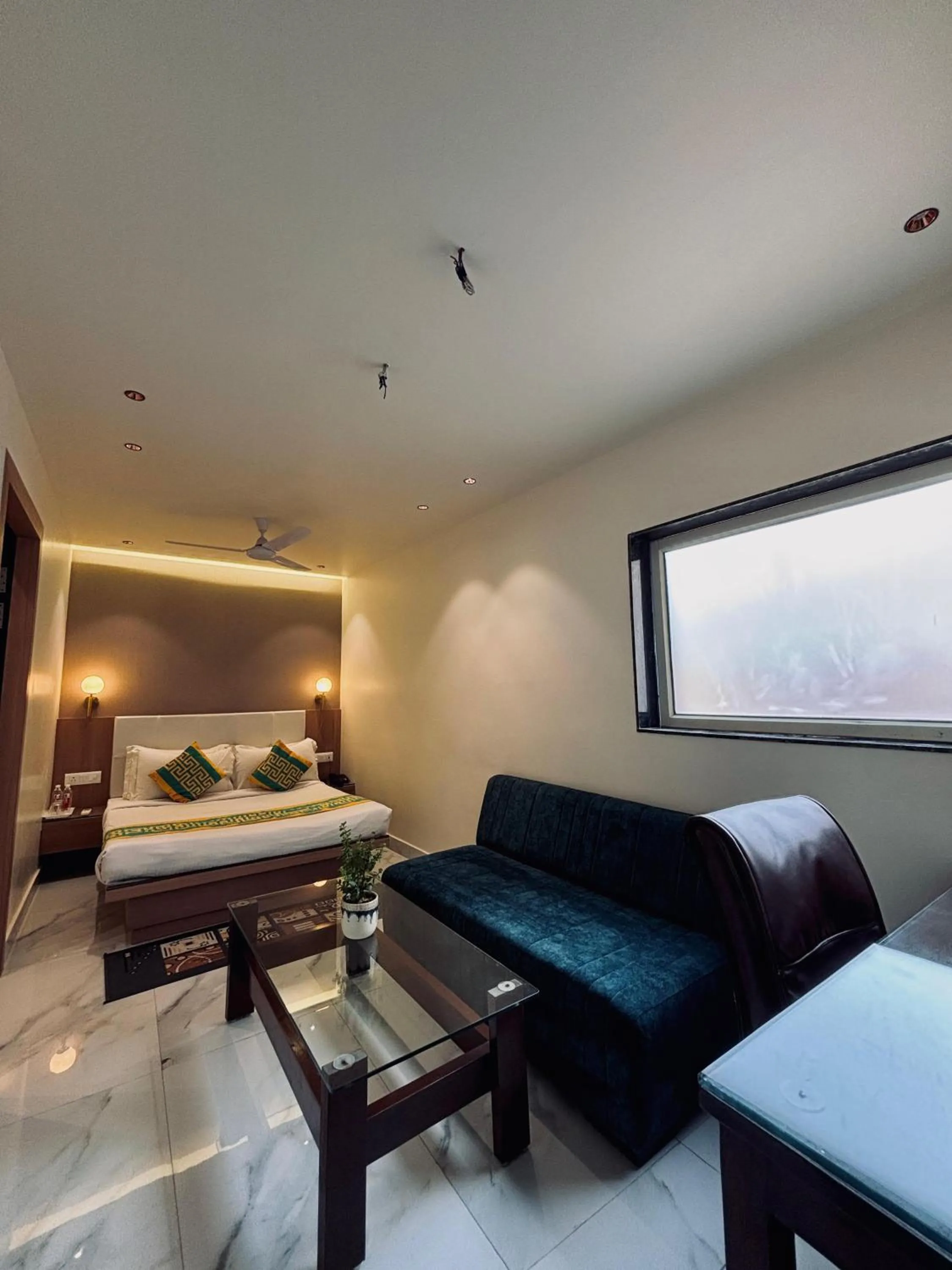 Bed in Taj Inn Hotel