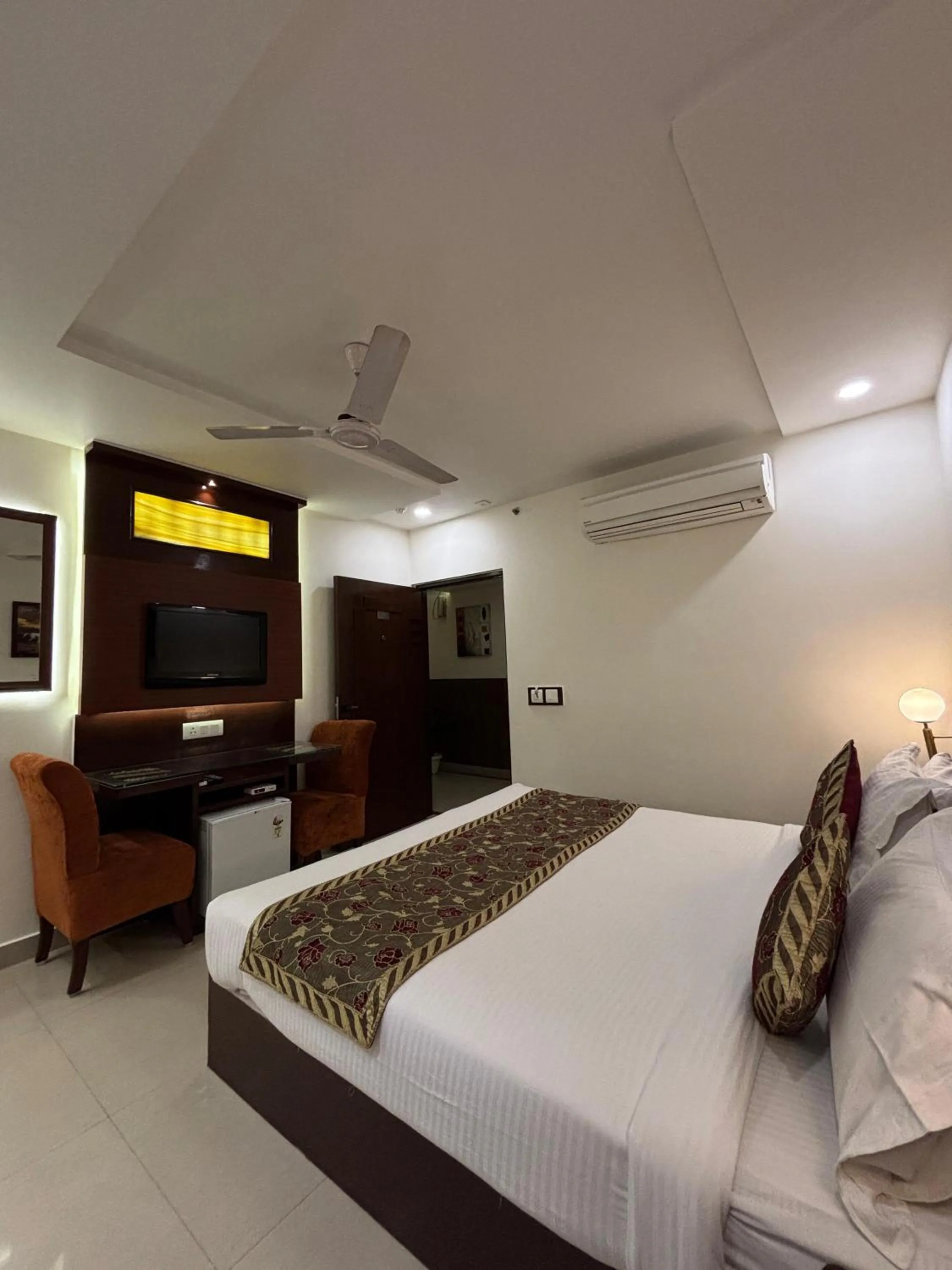 Bed in Taj Inn Hotel