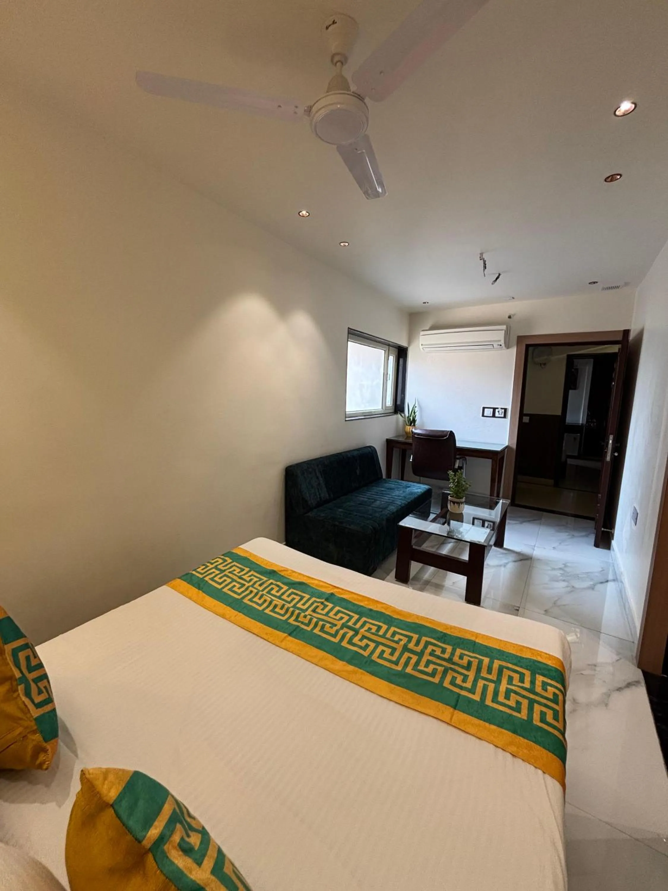 Bed in Taj Inn Hotel