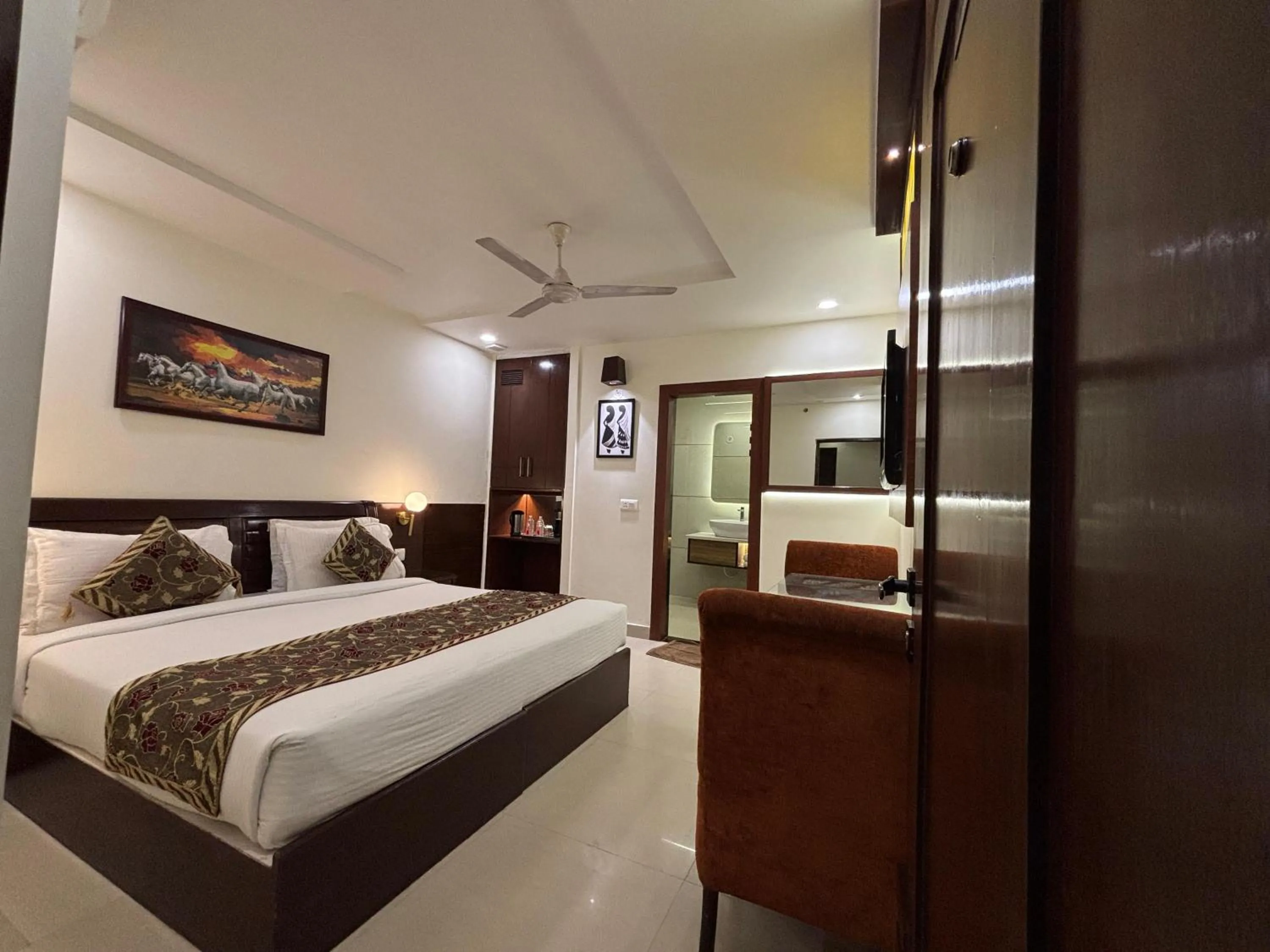 Bed in Taj Inn Hotel