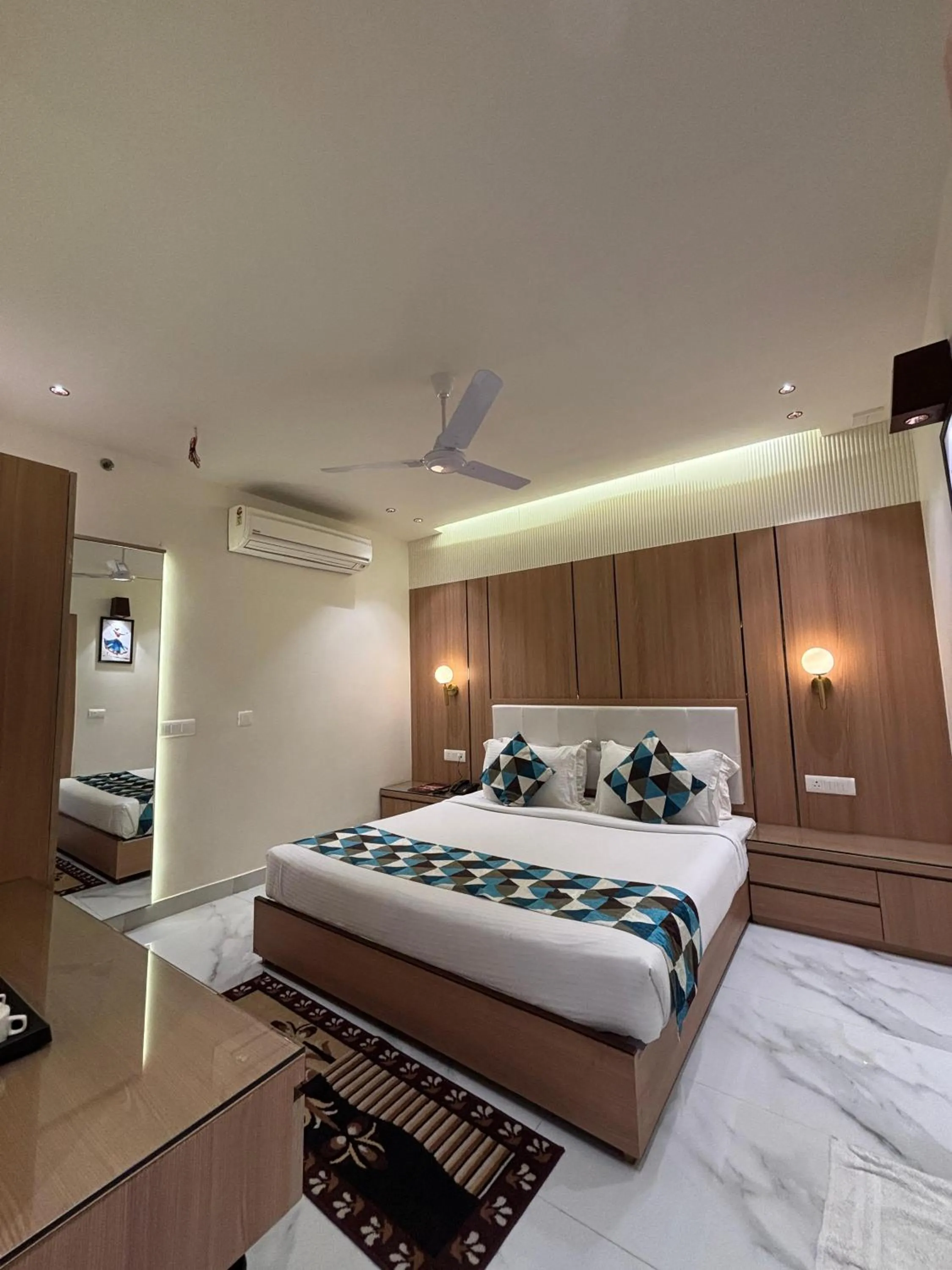 Bed in Taj Inn Hotel