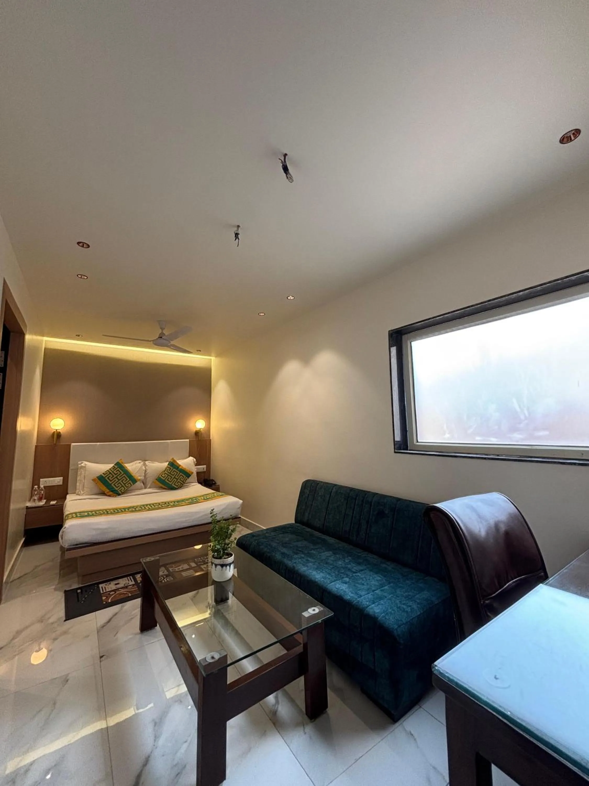 Bed in Taj Inn Hotel