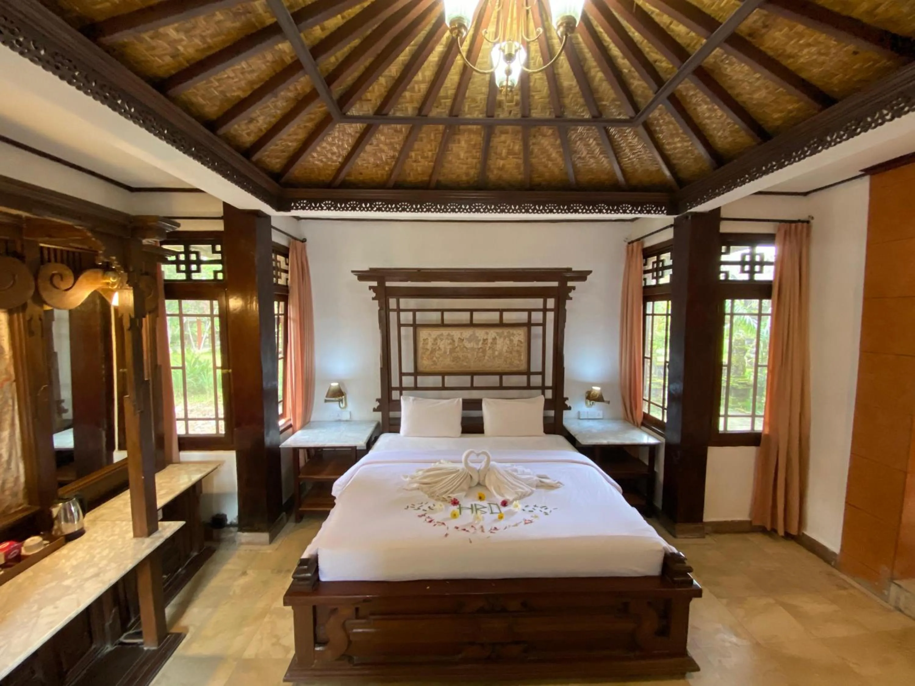 Bed in Suly Vegetarian Resort & Spa