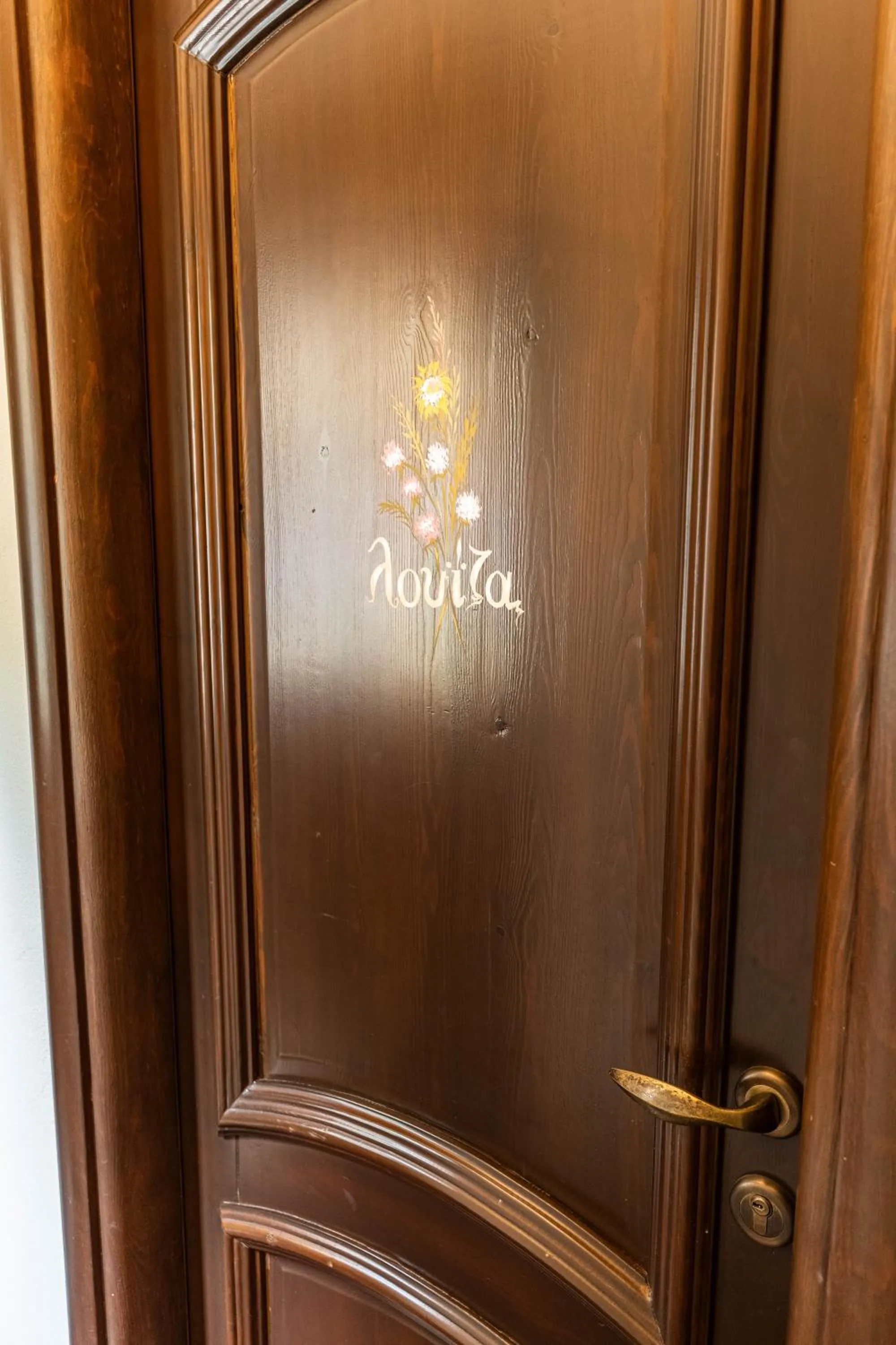 Logo/Certificate/Sign in Guesthouse Iris