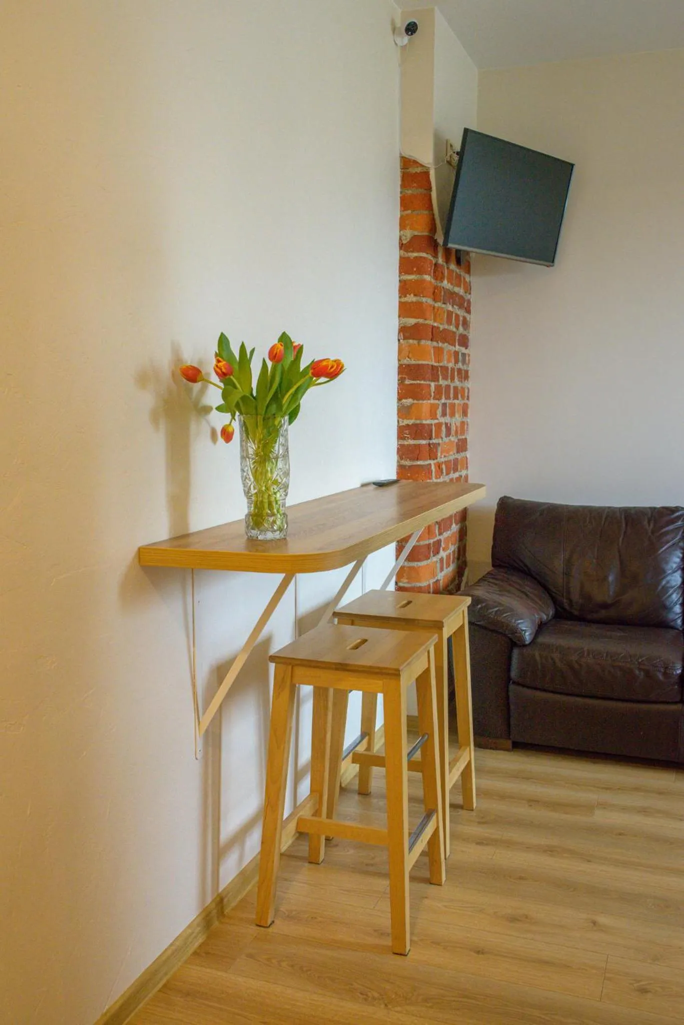 Communal lounge/ TV room in Klaipeda Hostel