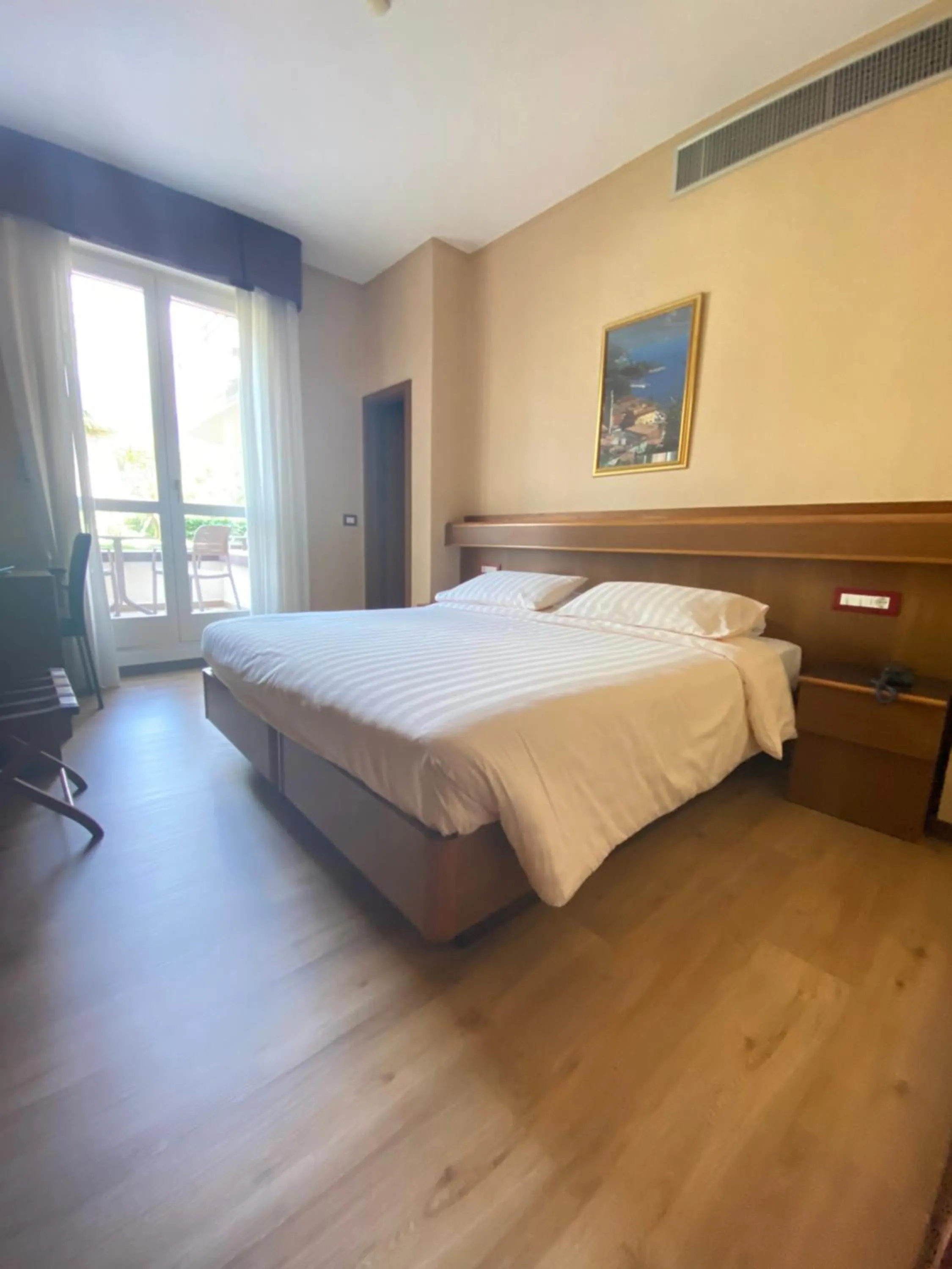 Bed in SunLake Hotel