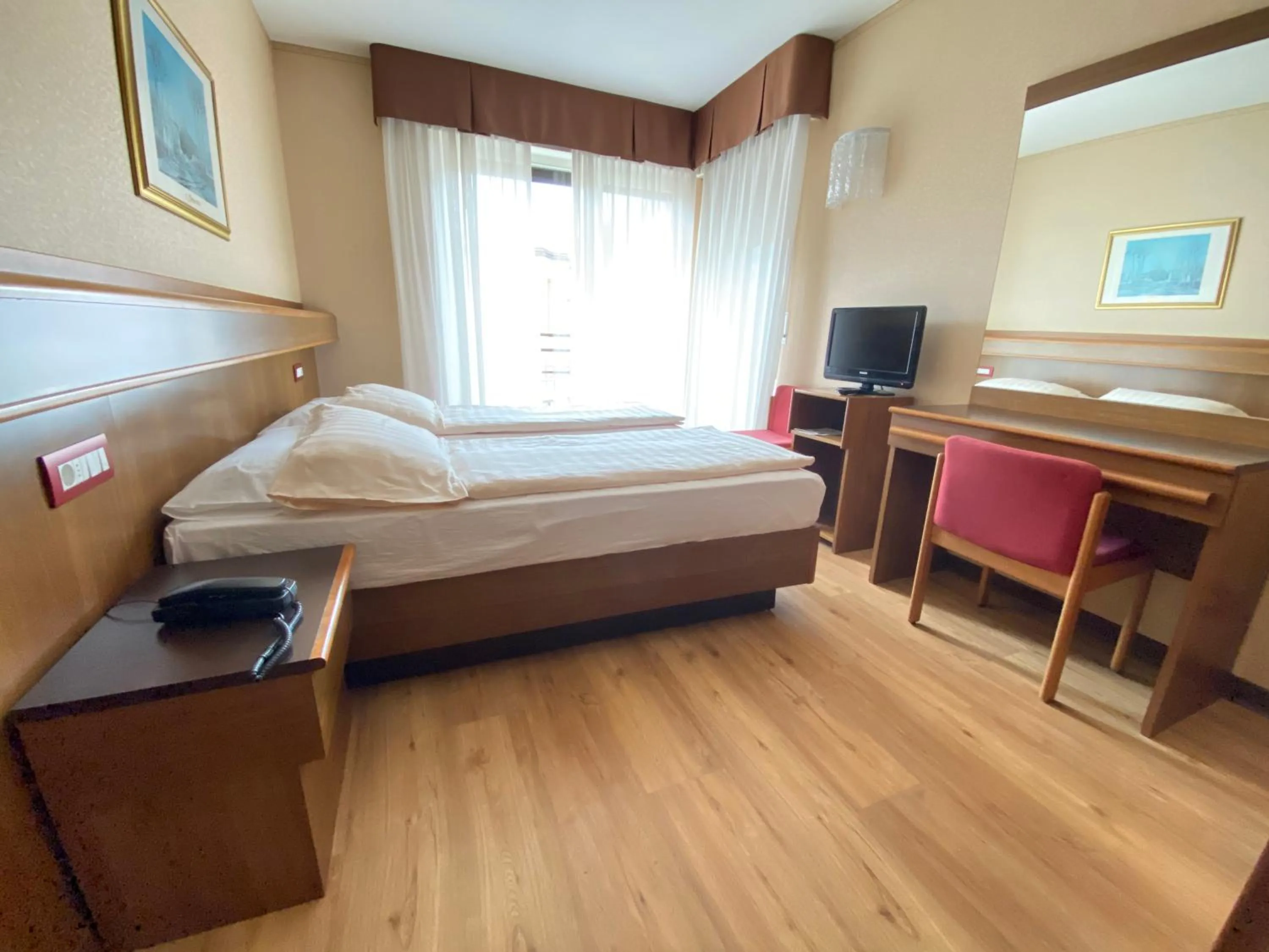 Bed in SunLake Hotel