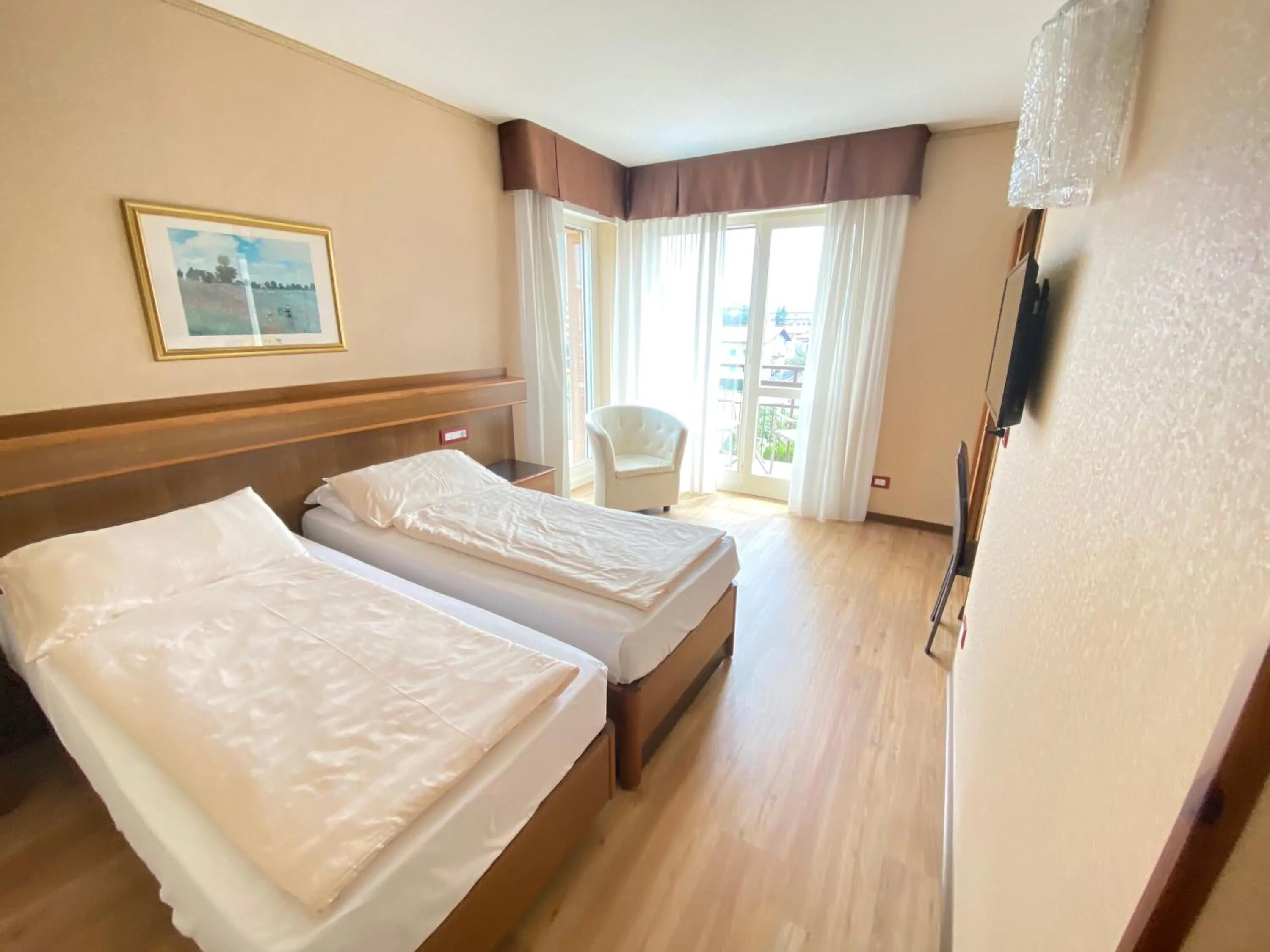 Bed in SunLake Hotel