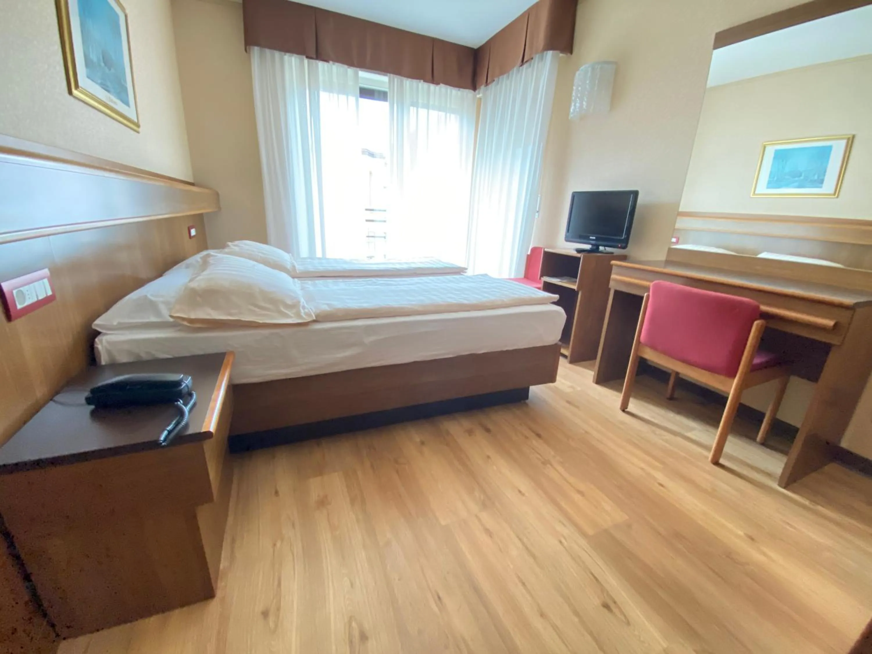 Bed in SunLake Hotel