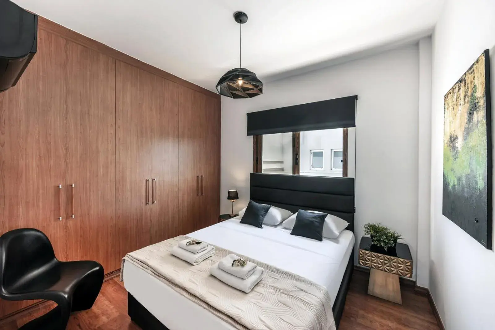 Bed in Captain Karas Holidays Apartments Bed in Captain Karas Holidays Apartments