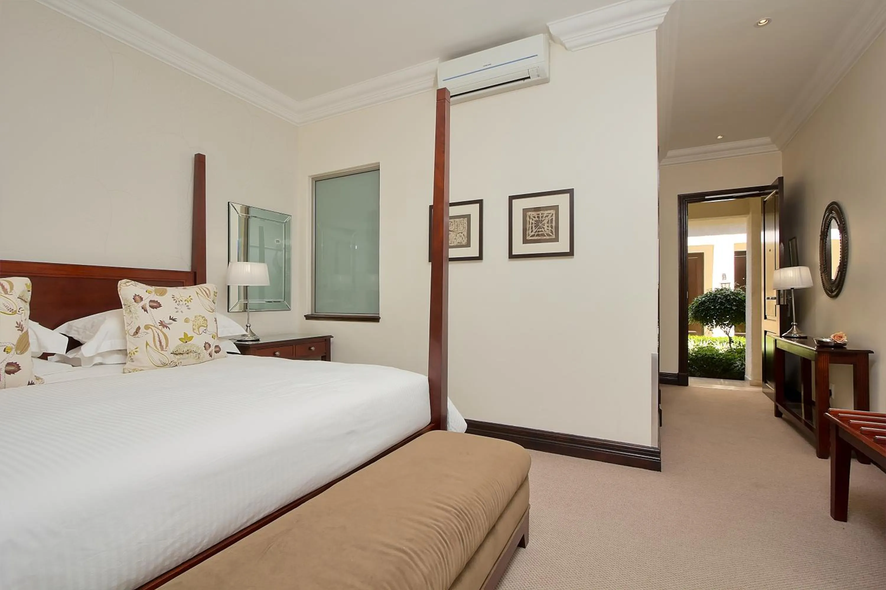 Bed in The Syrene Boutique Hotel