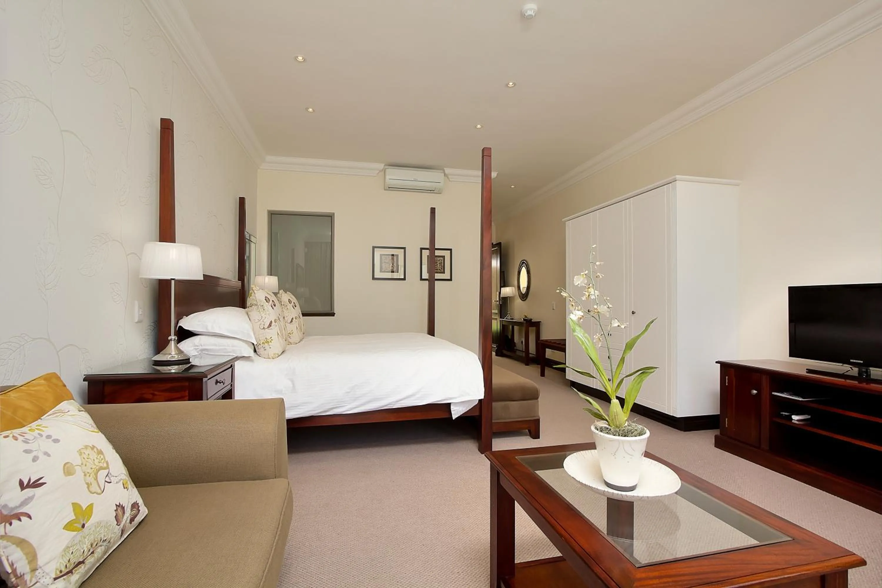 Bed in The Syrene Boutique Hotel