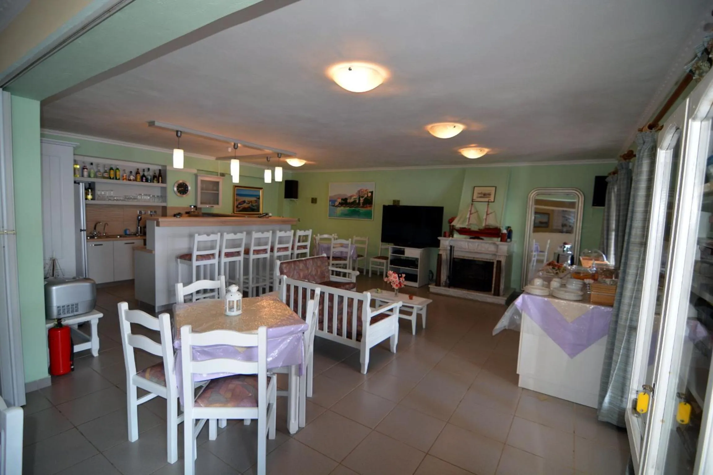 Communal lounge/ TV room in Stella Hotel Apartments