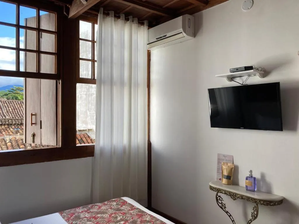 Photo of the whole room, Bed in Pousada Arte Urquijo