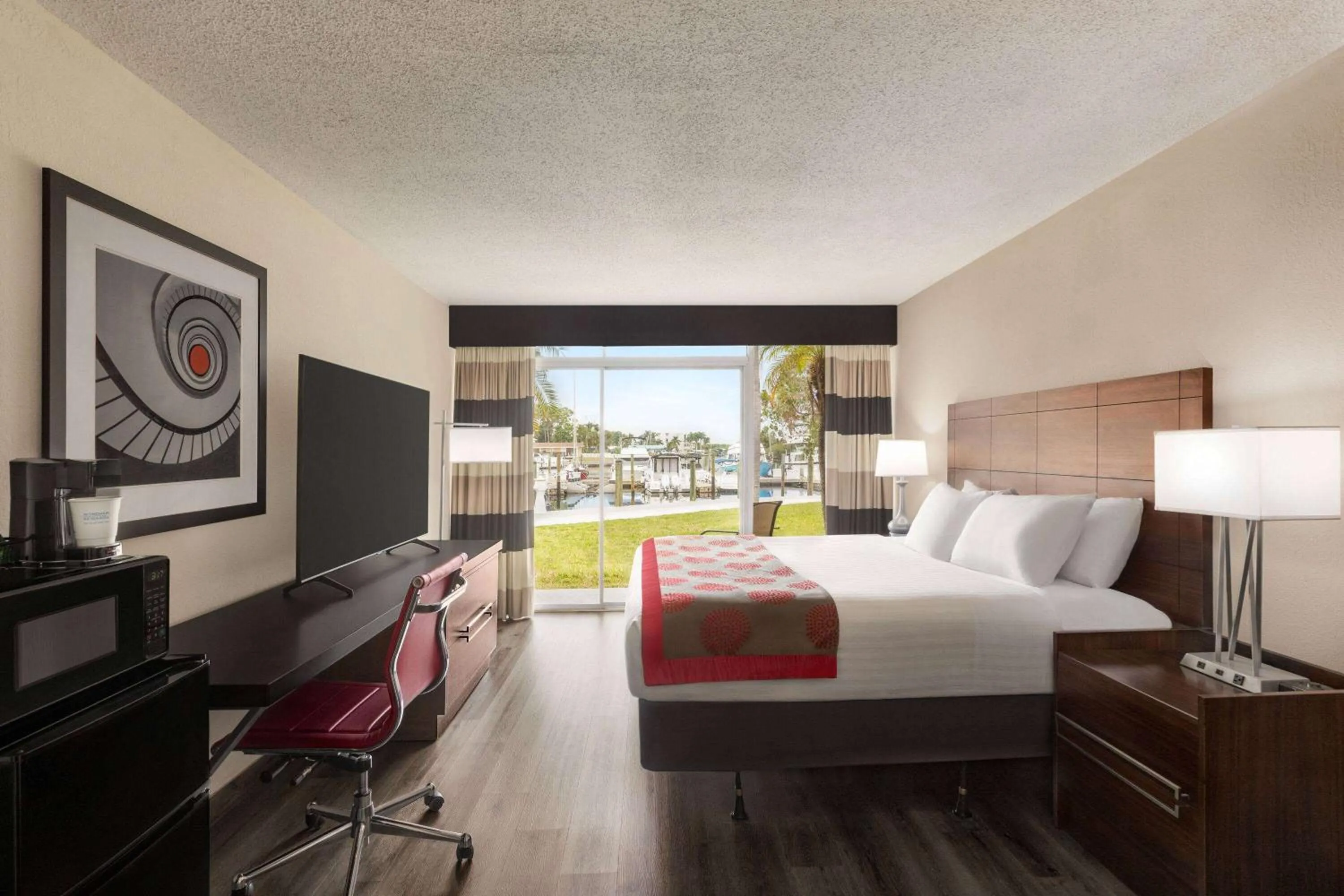 Photo of the whole room, Bed in Ramada by Wyndham Sarasota Waterfront