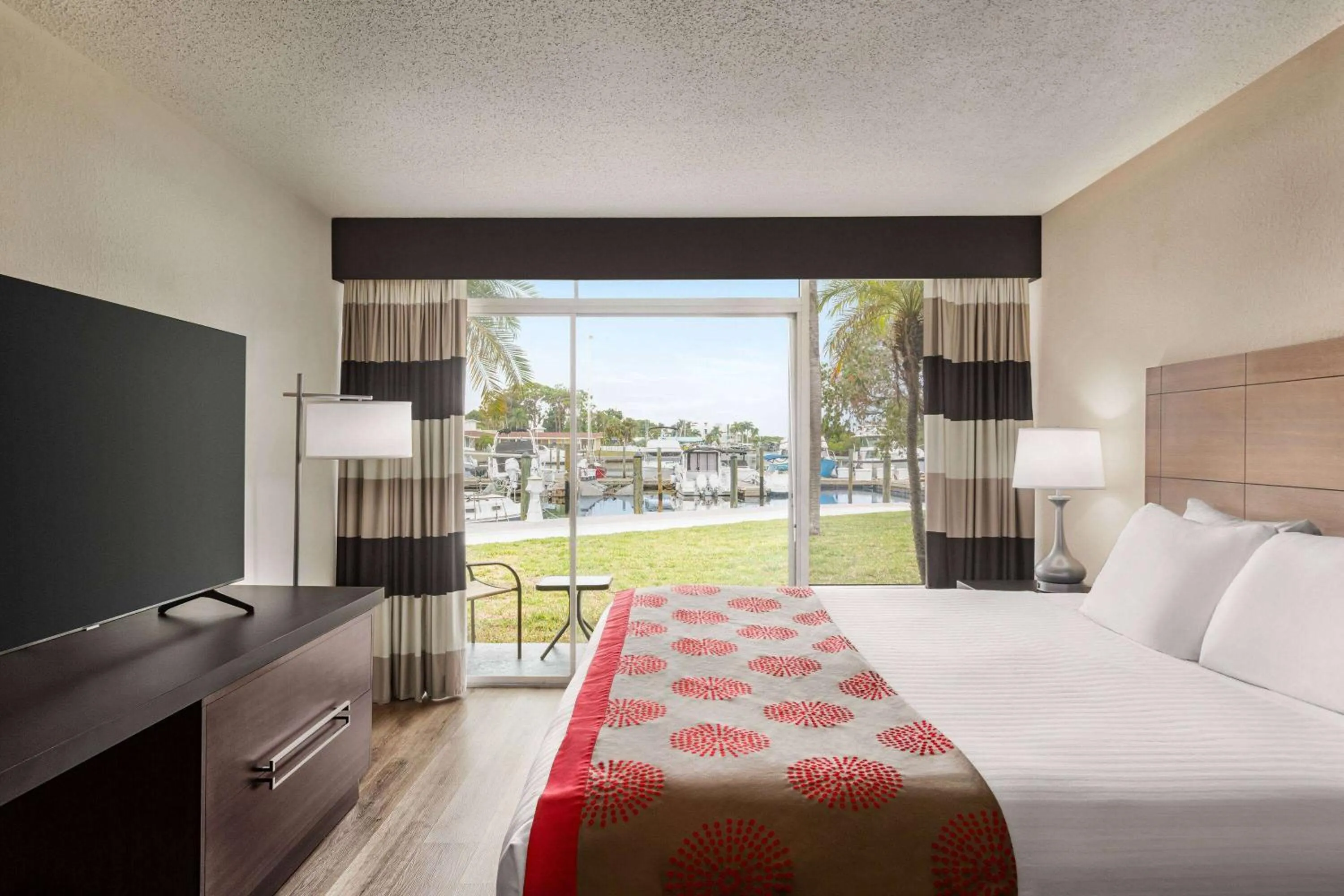 Photo of the whole room, Bed in Ramada by Wyndham Sarasota Waterfront