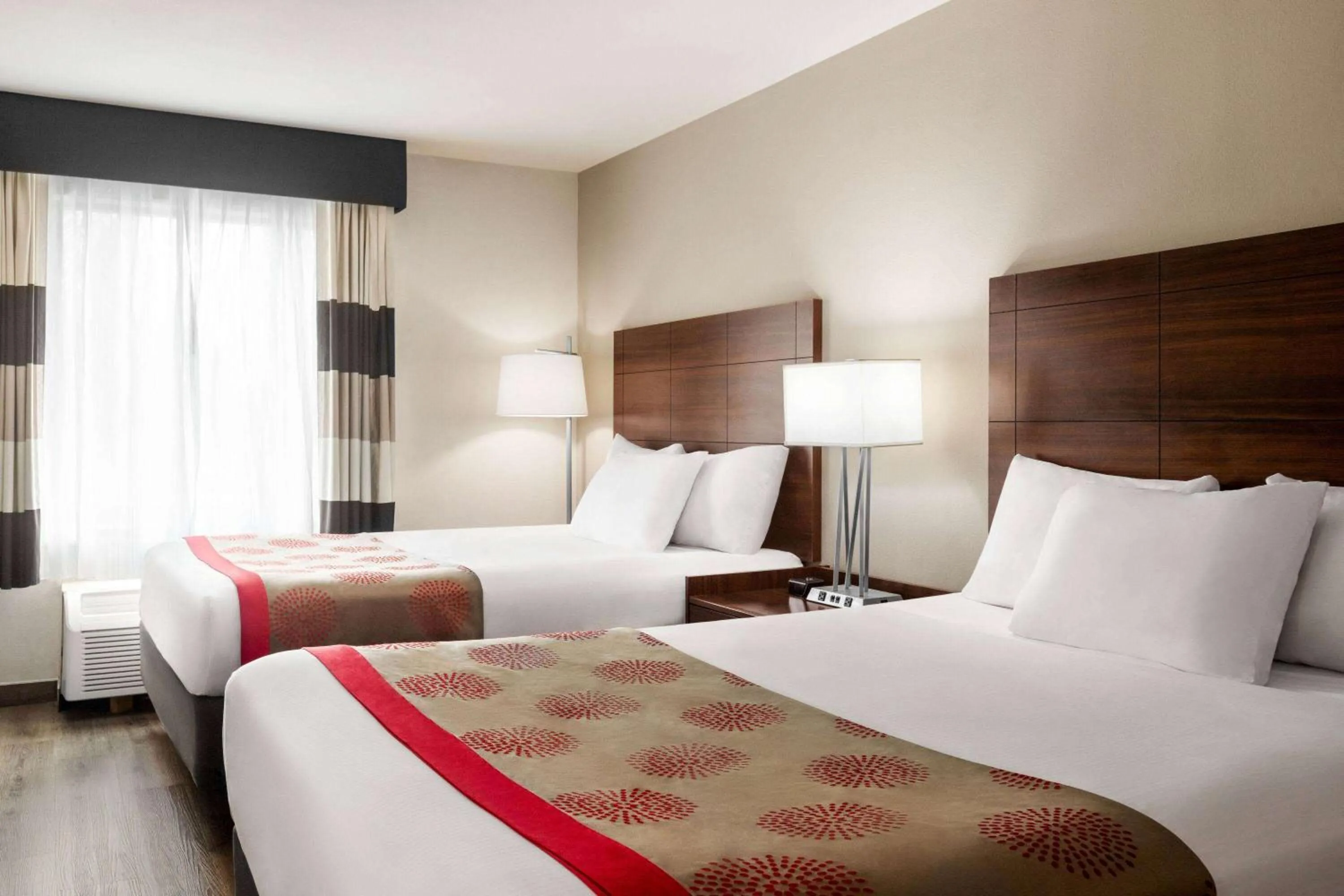 Photo of the whole room, Bed in Ramada by Wyndham Sarasota Waterfront