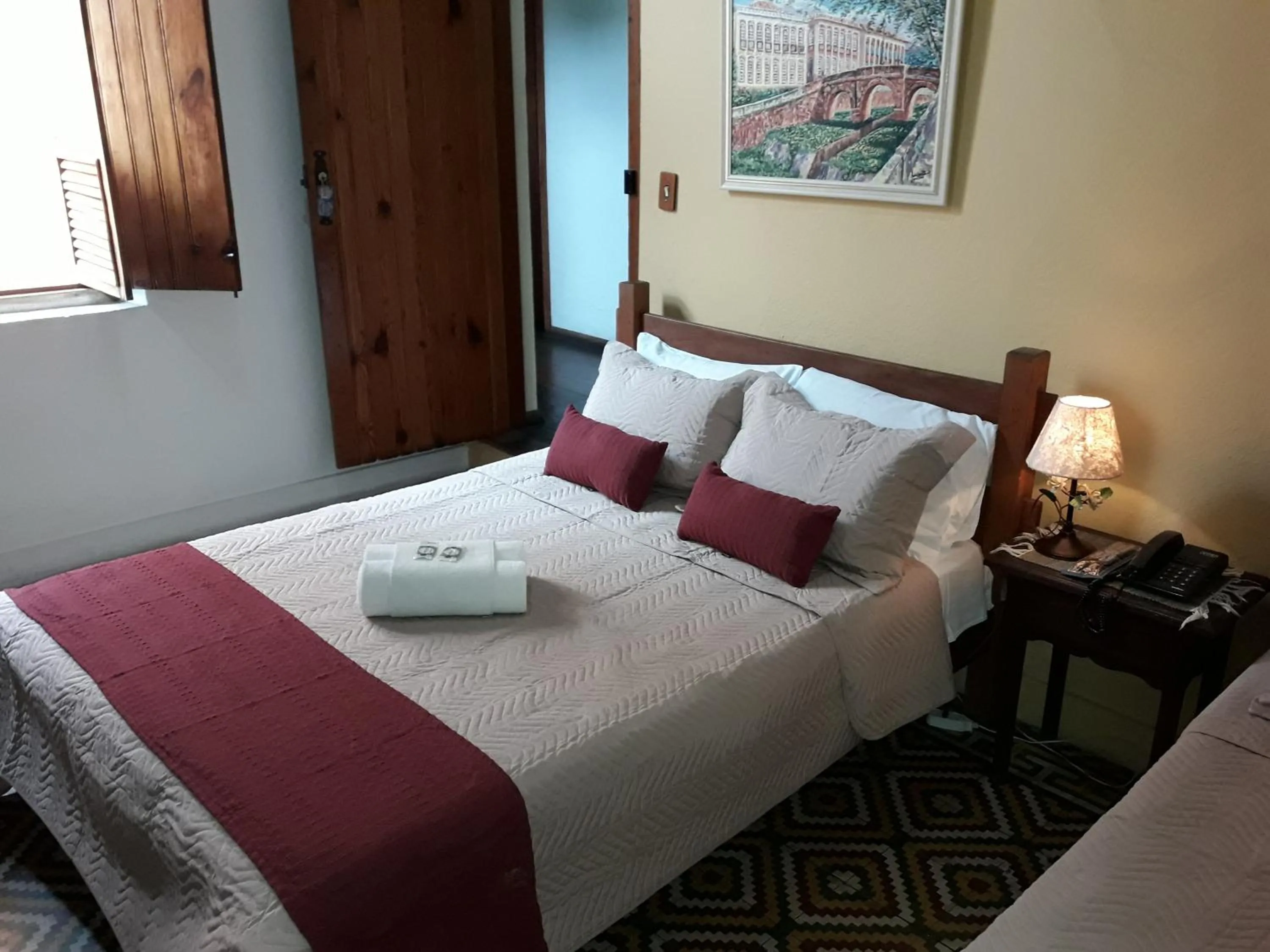 Bed in Pousada Estação do Trem