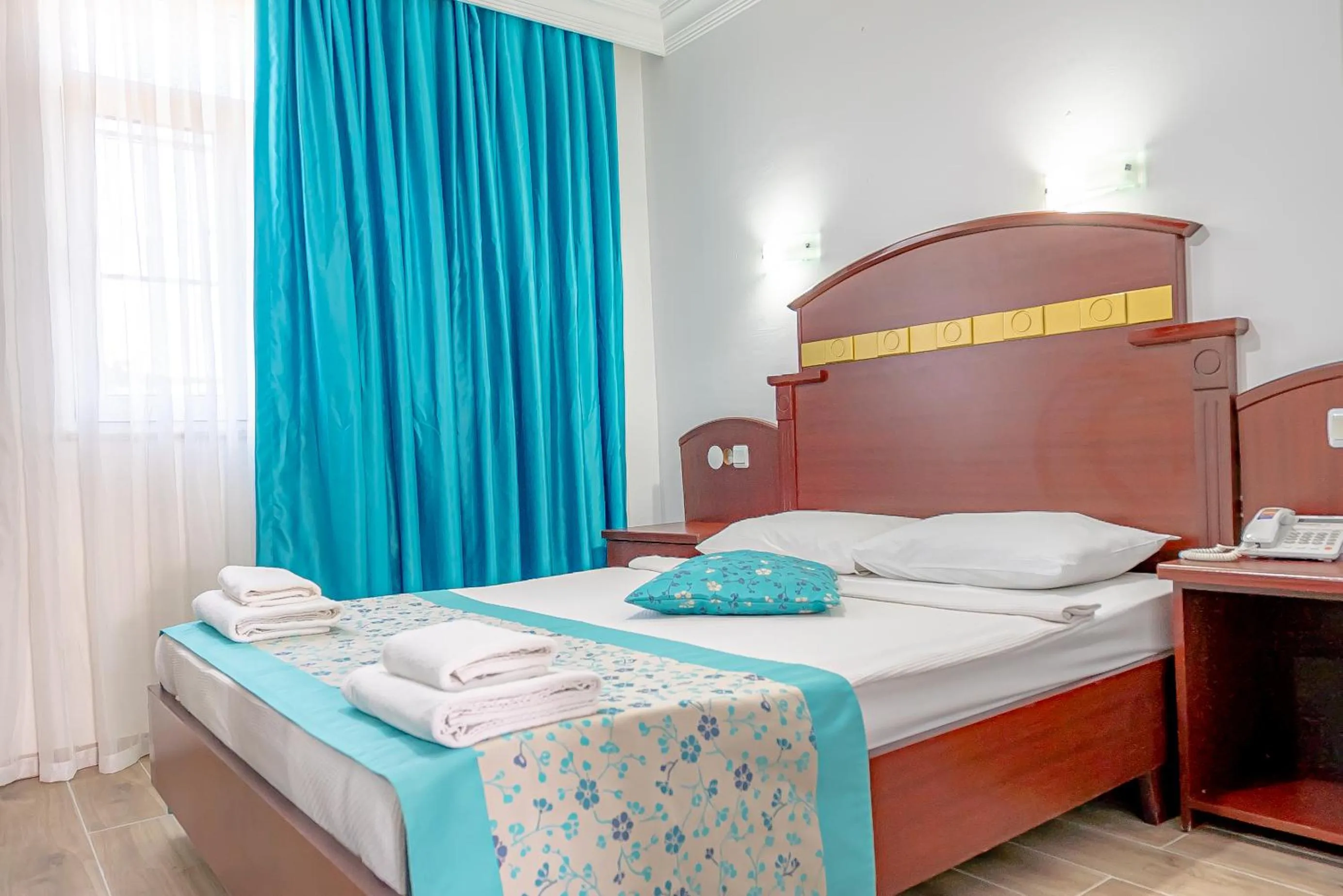 Bed in Sunberk Hotel