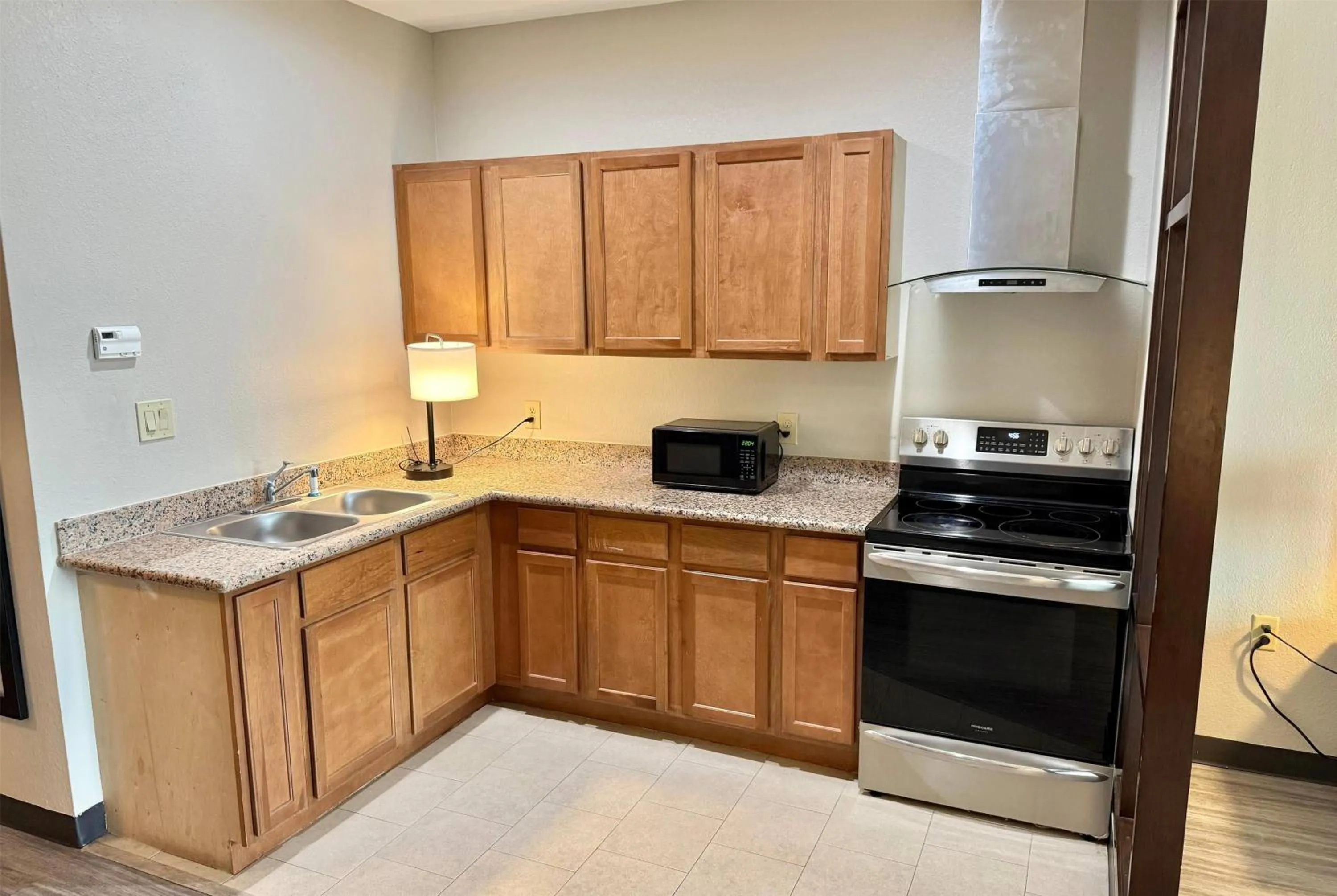 Photo of the whole room in Days Inn & Suites by Wyndham Houston / West Energy Corridor