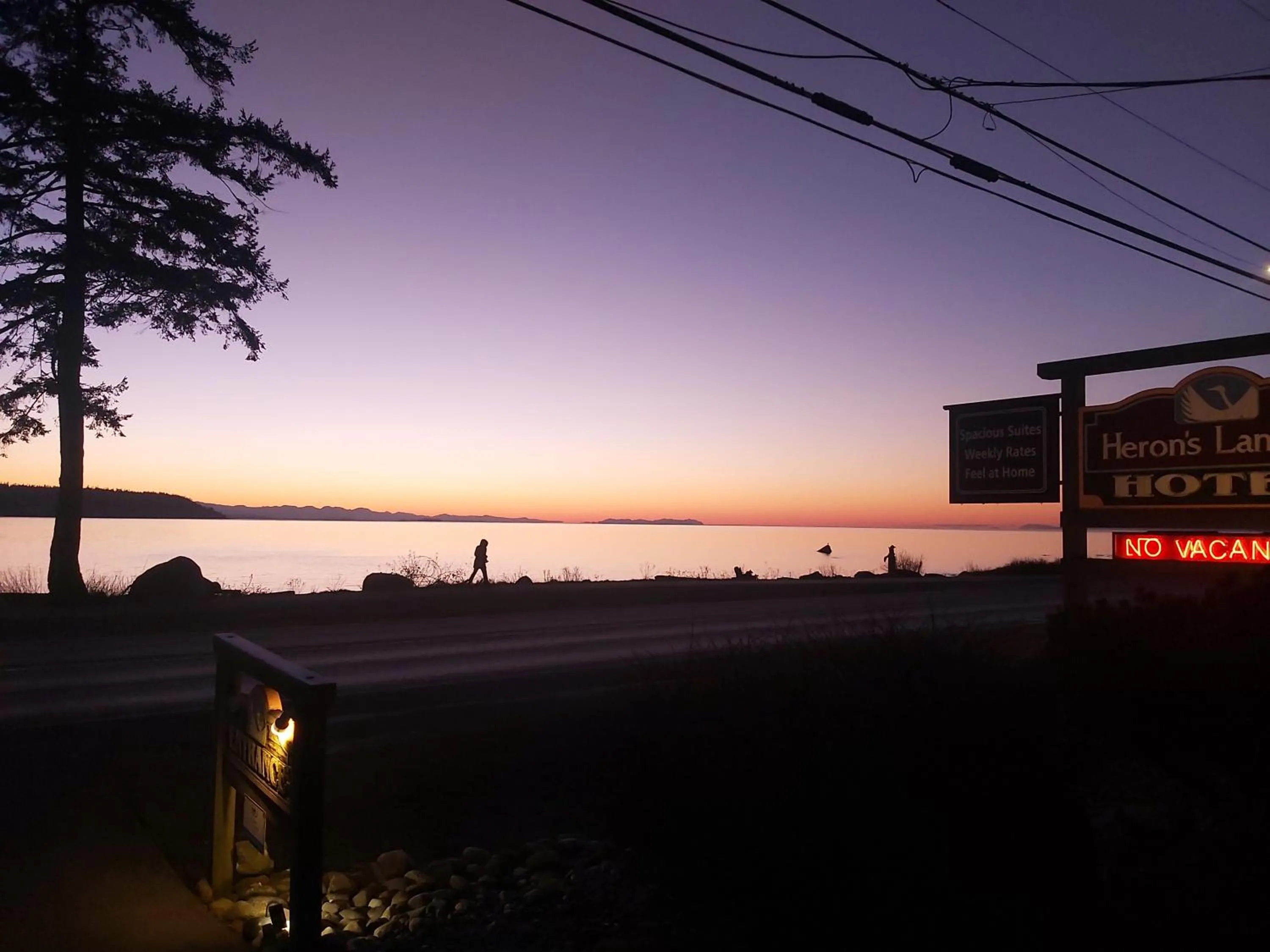 Property logo or sign in Heron's Landing Hotel