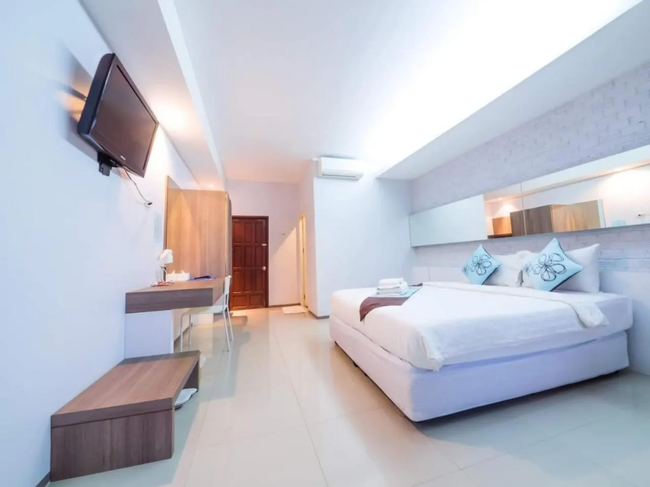 Bed in Panlaan Boutique Resort