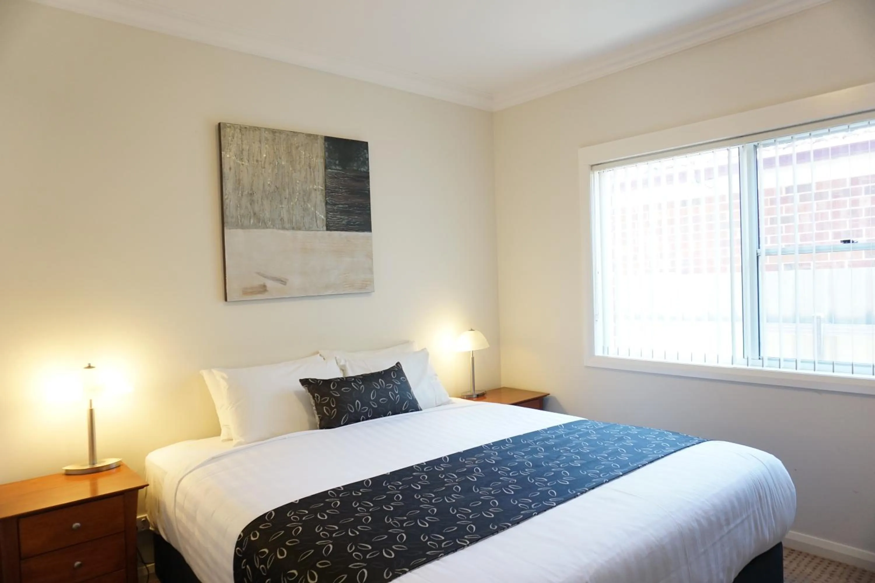 Bed in Charles Sturt Suites & Apartments