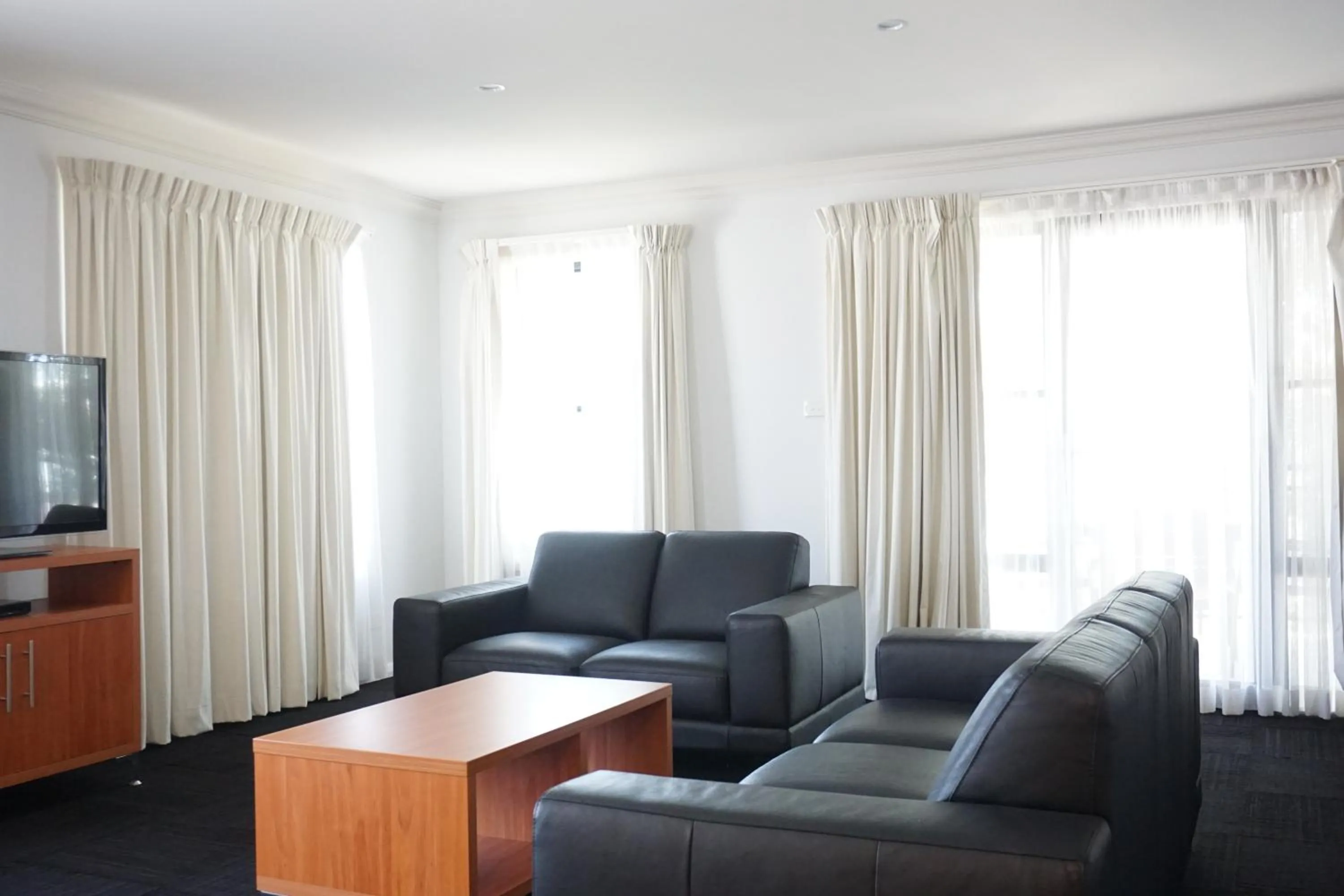 Living room, Seating Area in Charles Sturt Suites & Apartments
