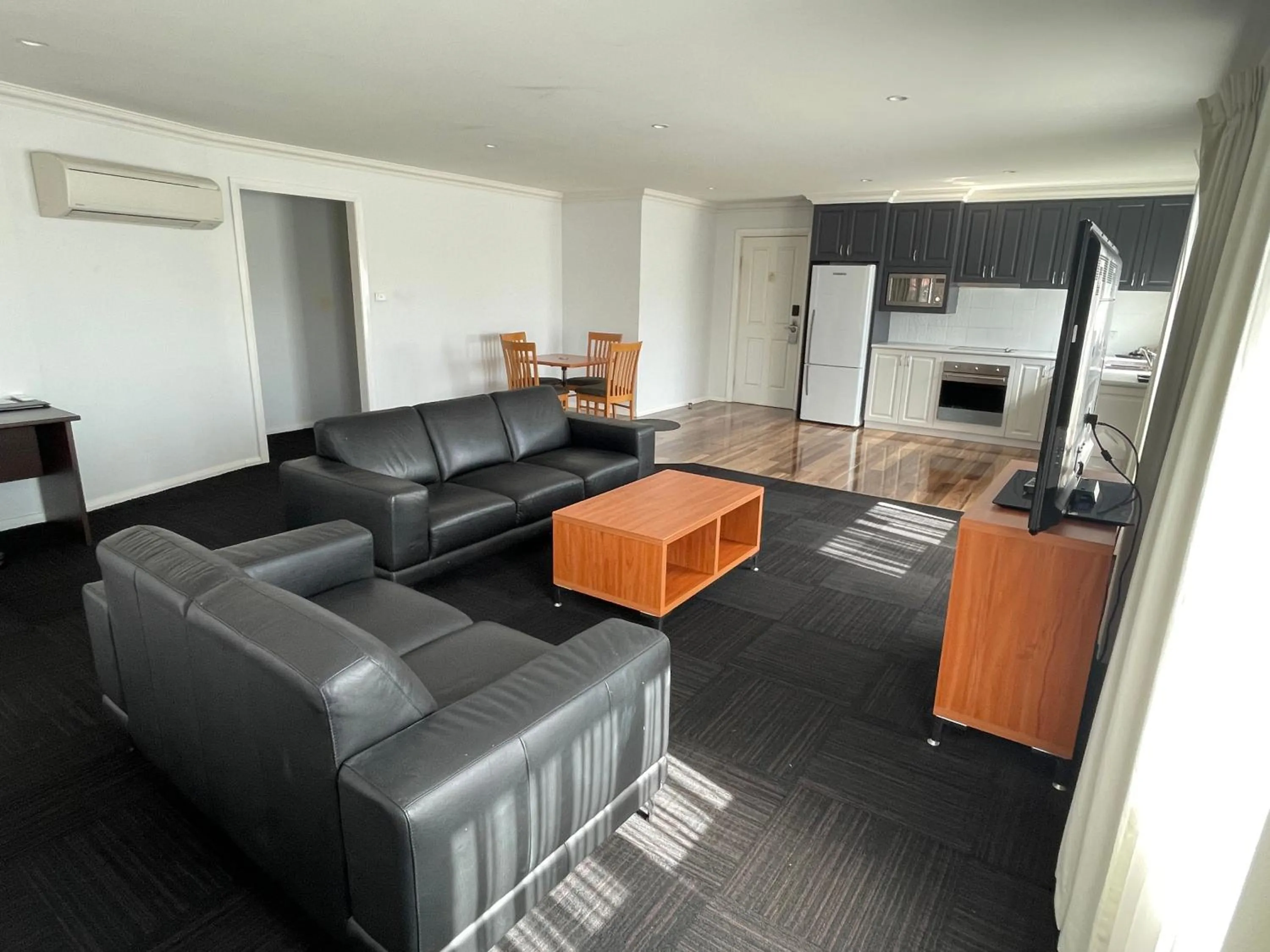 Living room, Seating Area in Charles Sturt Suites & Apartments