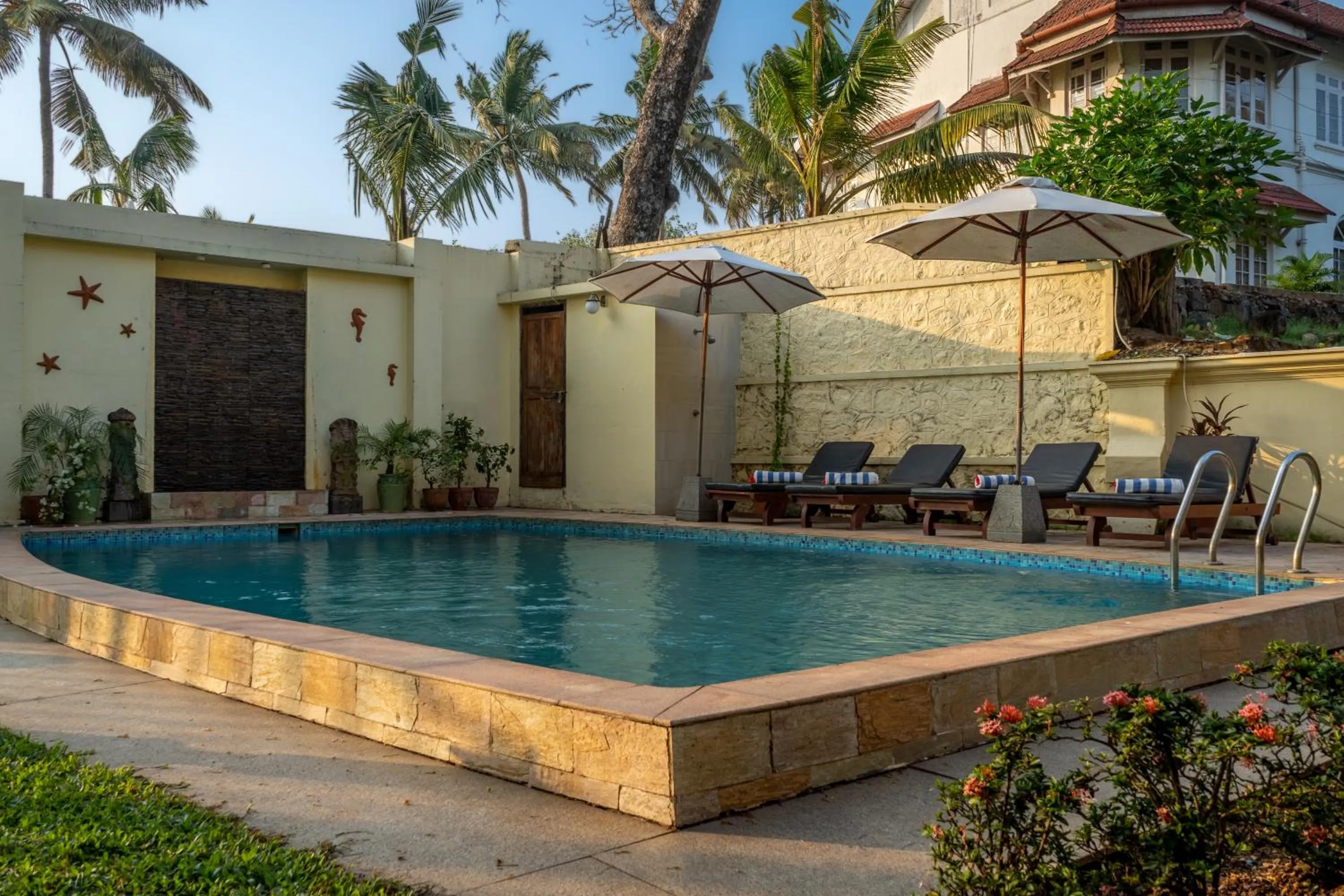 Swimming pool in Amritara The Poovath Beachfront Heritage, Fort Kochi