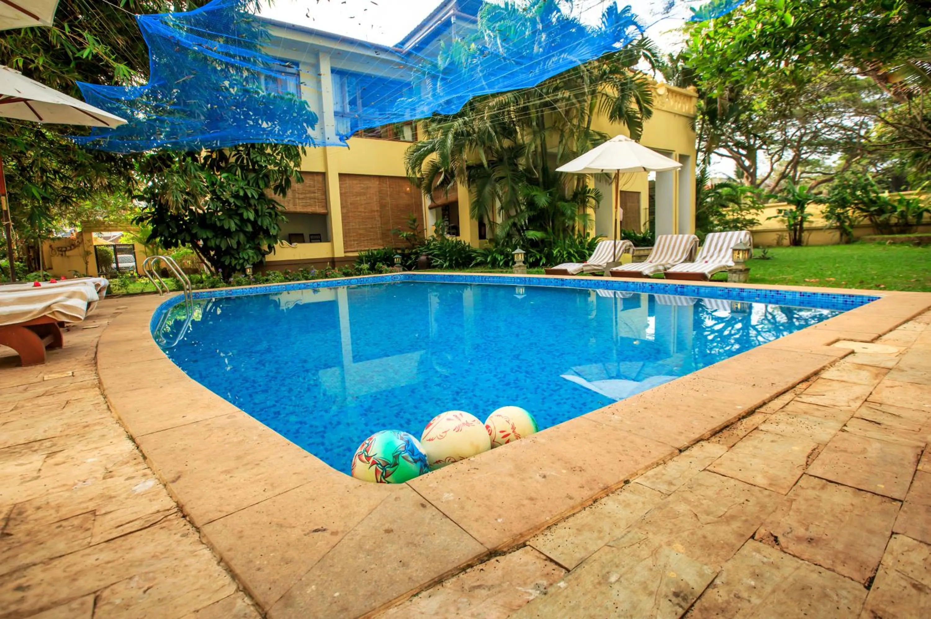 Swimming pool in Amritara The Poovath Beachfront Heritage, Fort Kochi