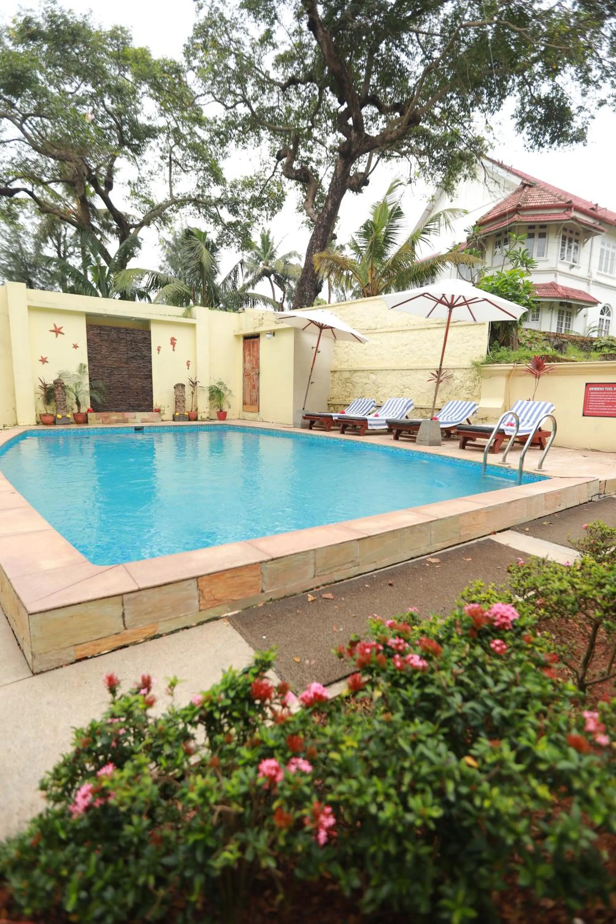 Swimming pool in Amritara The Poovath Beachfront Heritage, Fort Kochi