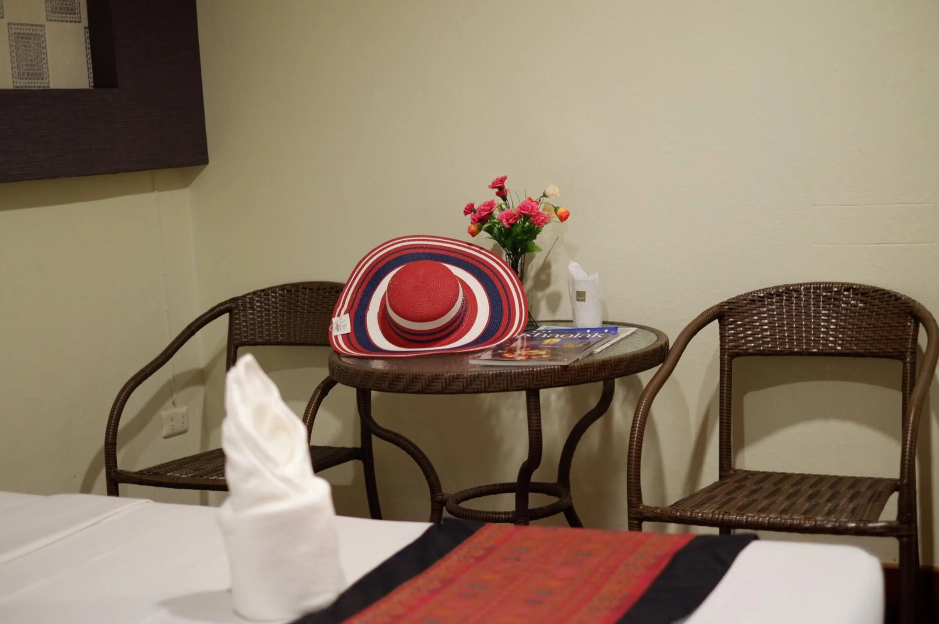 Dining area, Bed in Khaolak Grand City