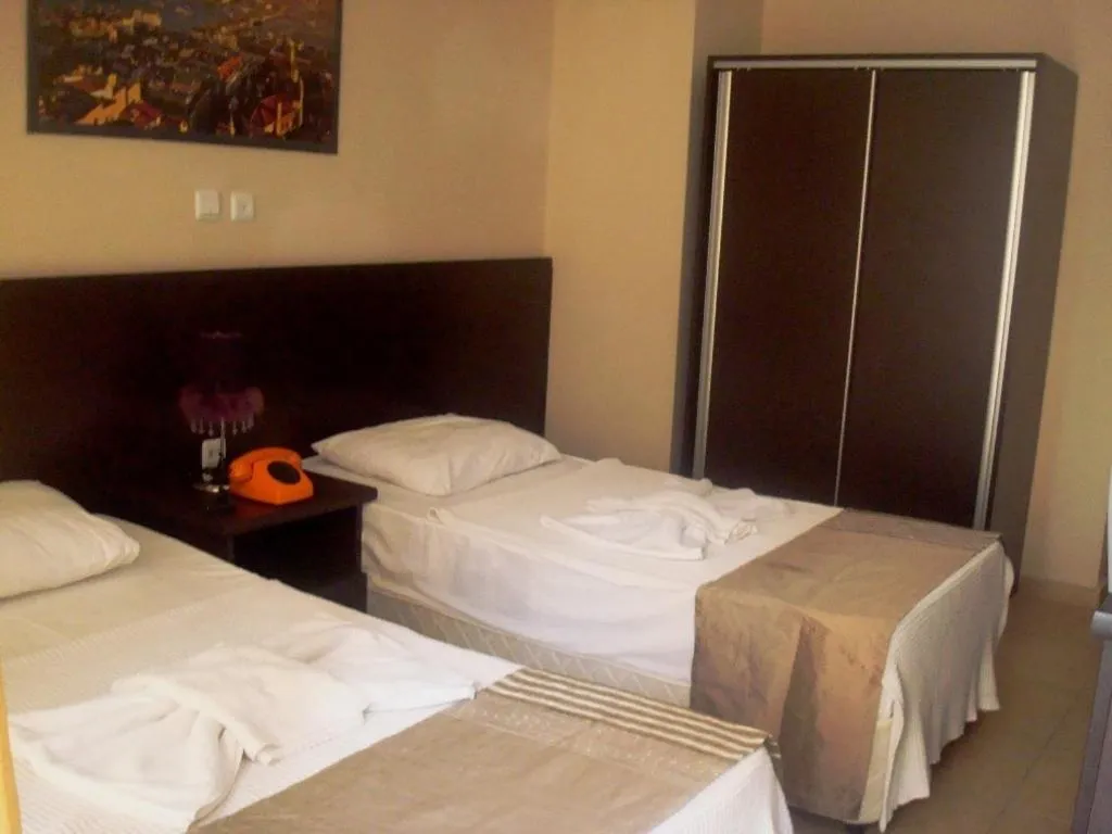 Bed in Kartel Hotel