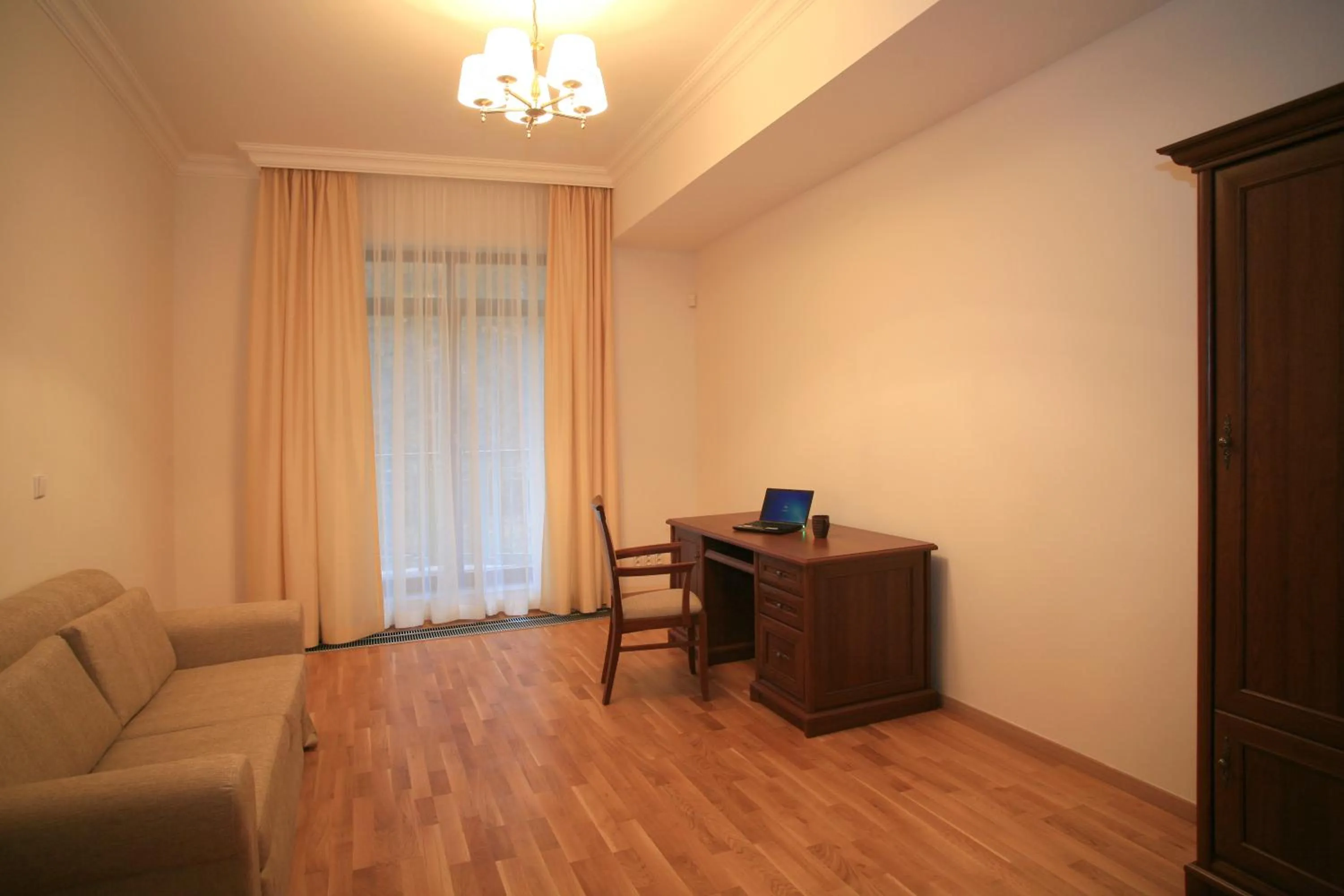 Seating area in Slunecni Lazne Apartments