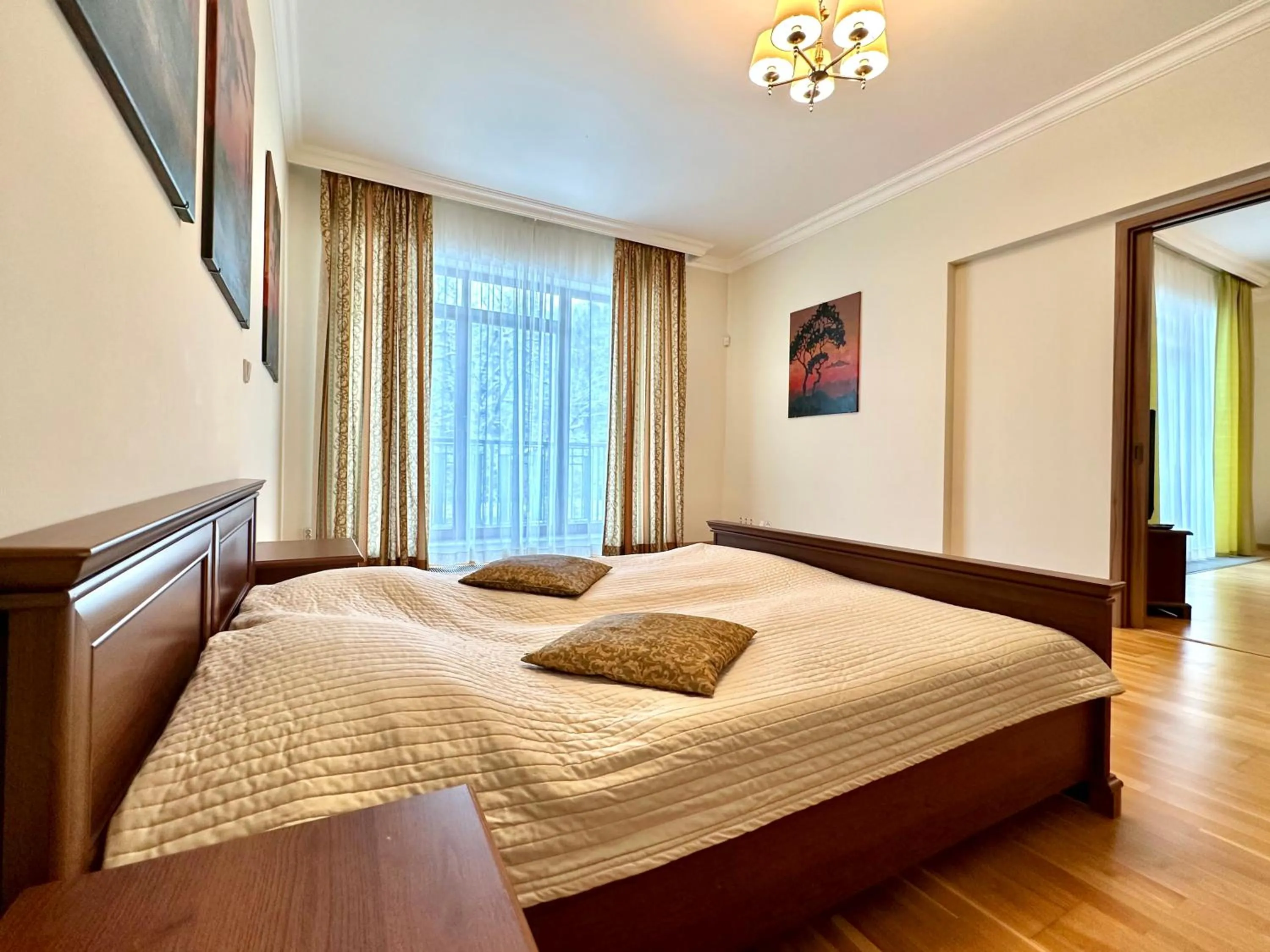 Bed in Slunecni Lazne Apartments