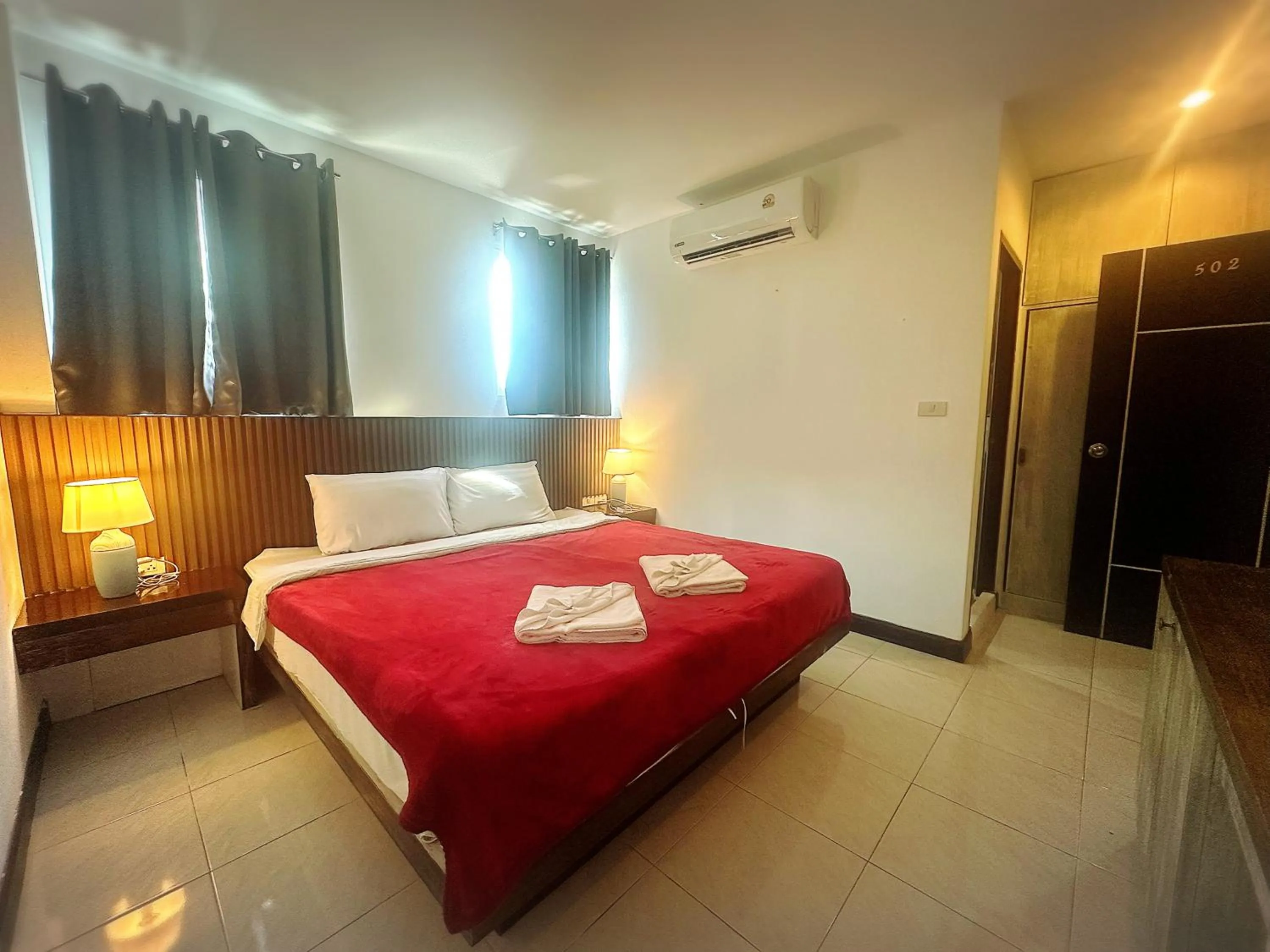 Bed in The Shades Hotel 50 meter Beach Front