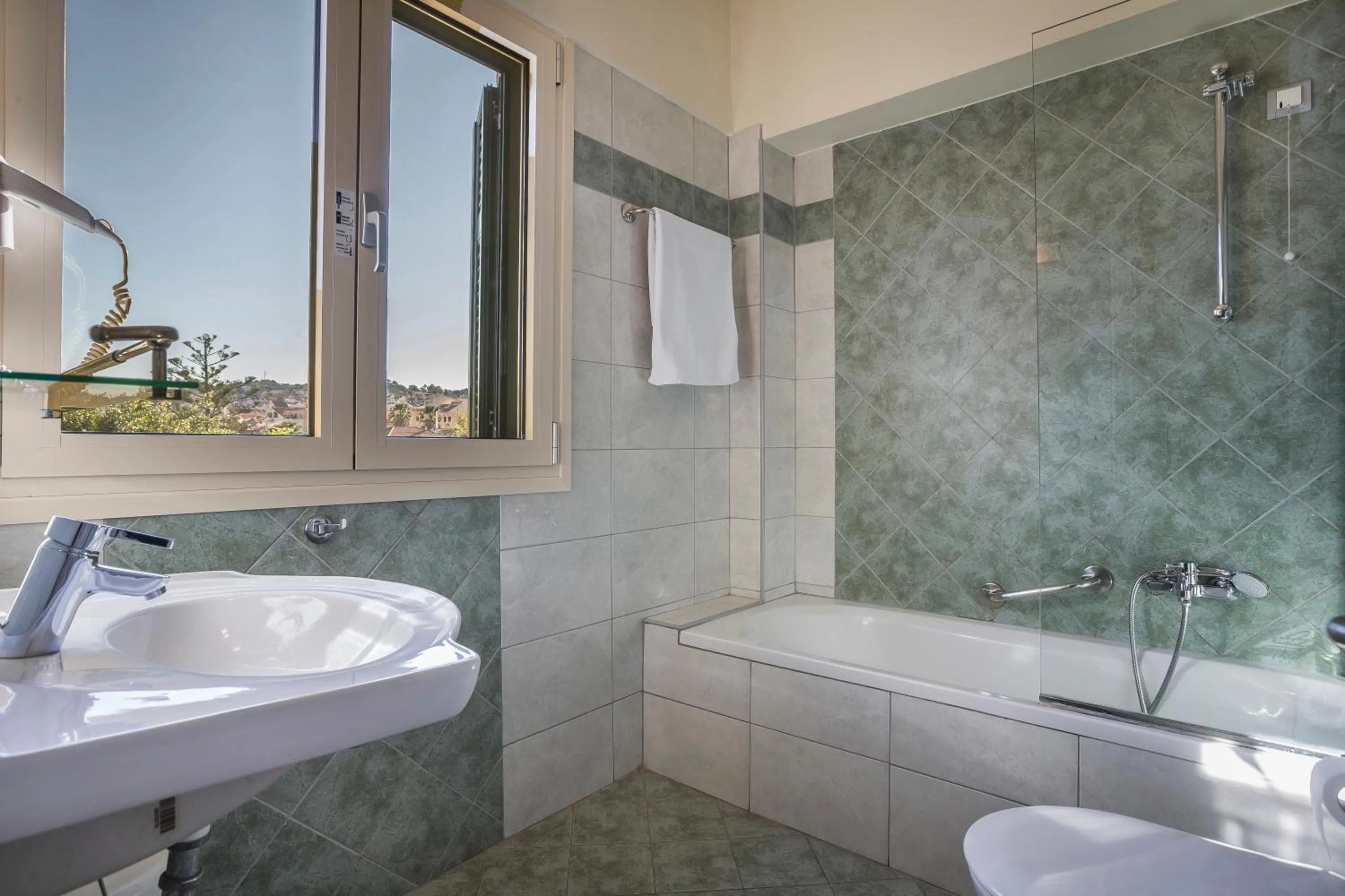 Bathroom in Ionian Plaza Hotel & Spa