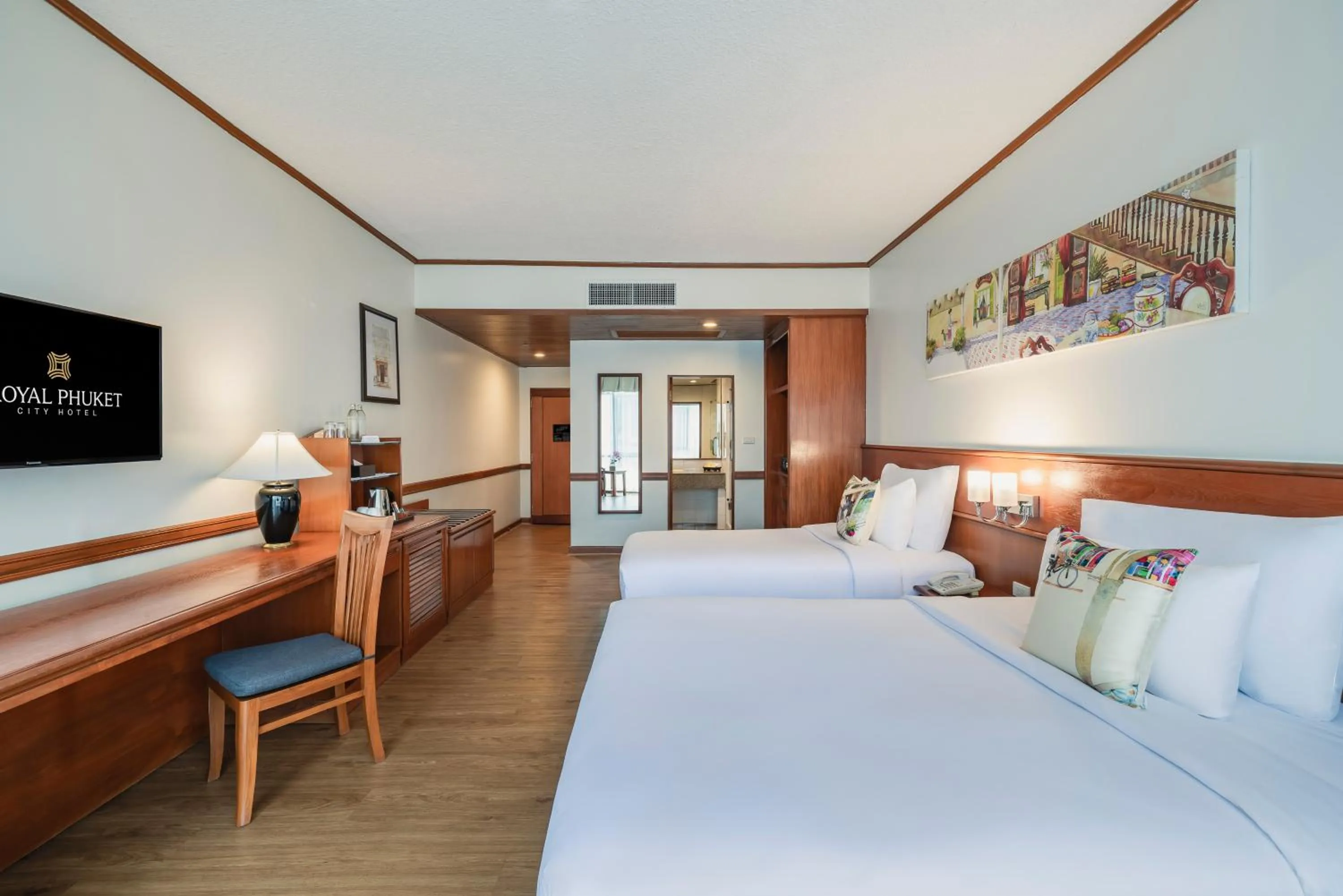 Bed in Royal Phuket City Hotel