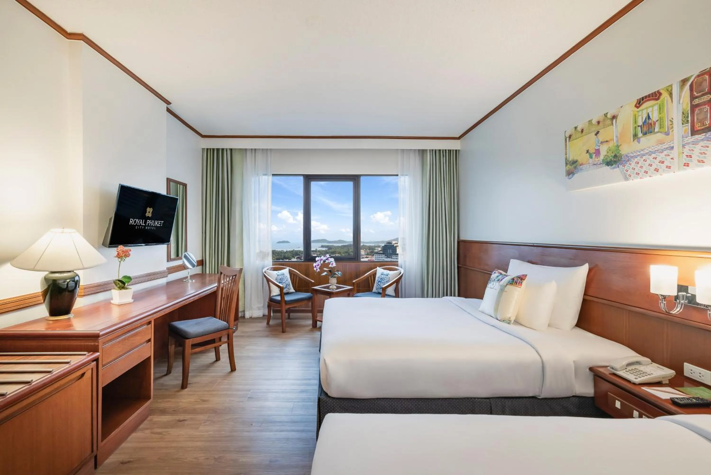 Bed in Royal Phuket City Hotel