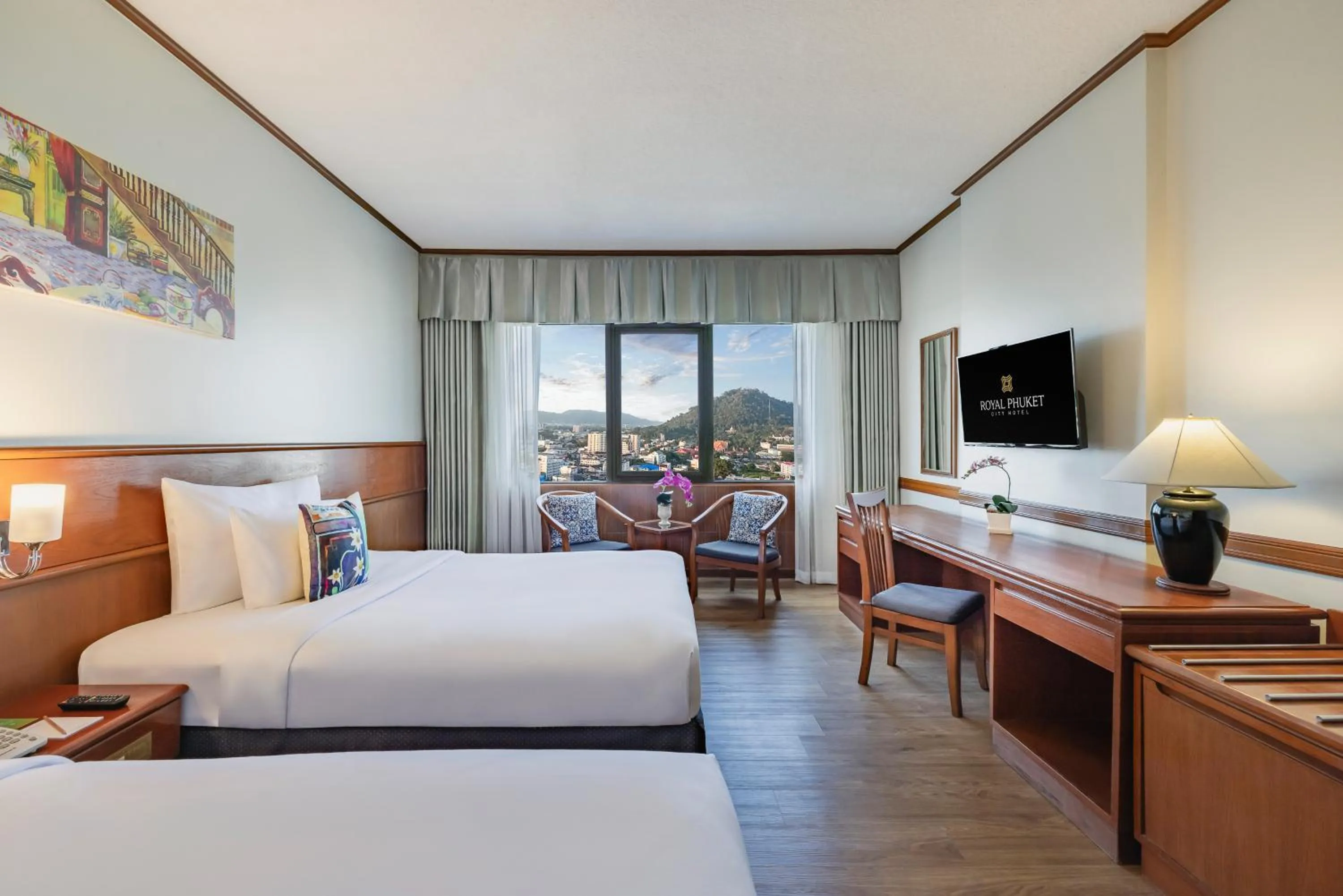 Bed in Royal Phuket City Hotel