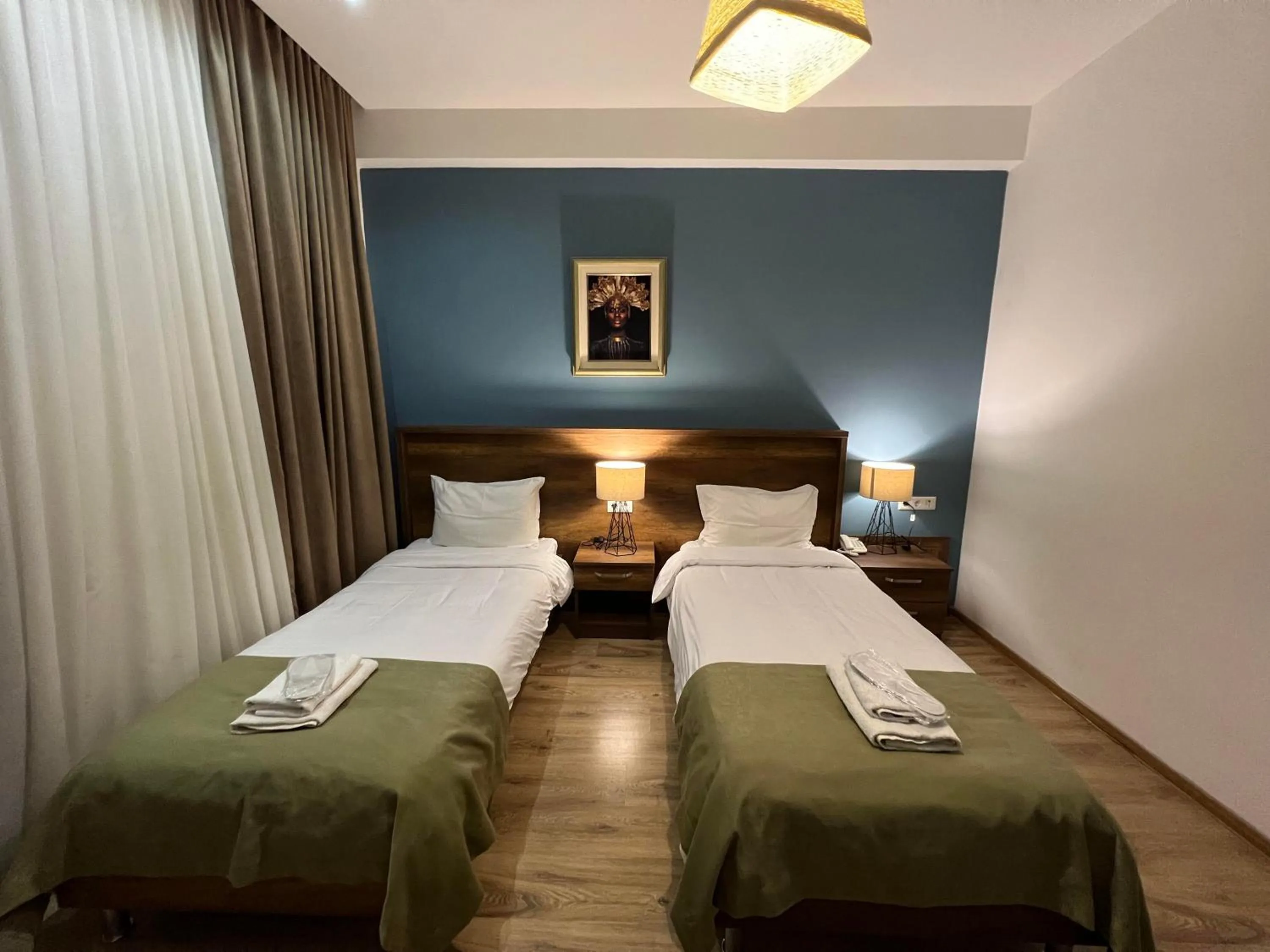 Bed in Hotel King Tom