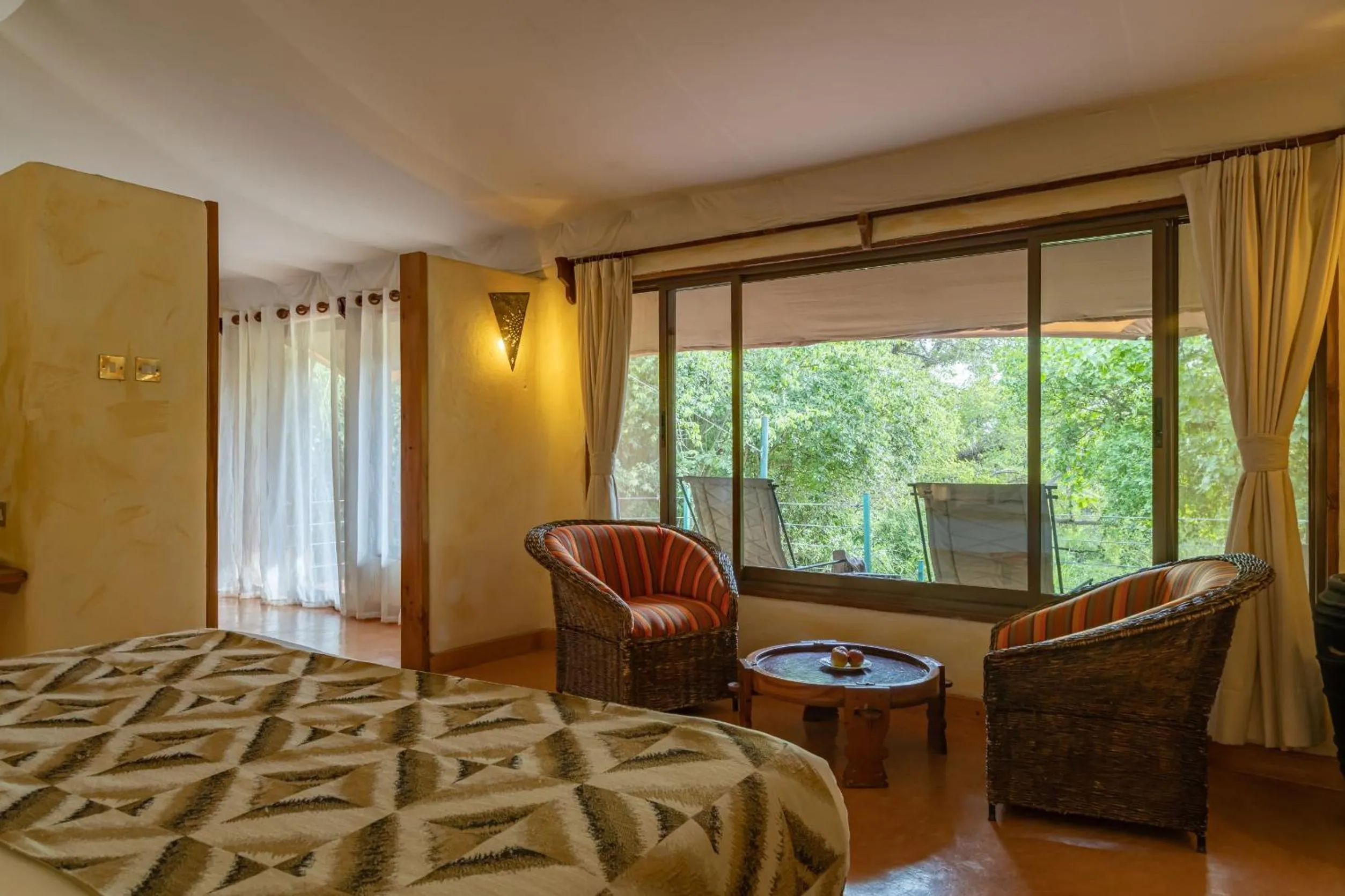 Seating area, Bed in PrideInn Mara Camp & Cottages