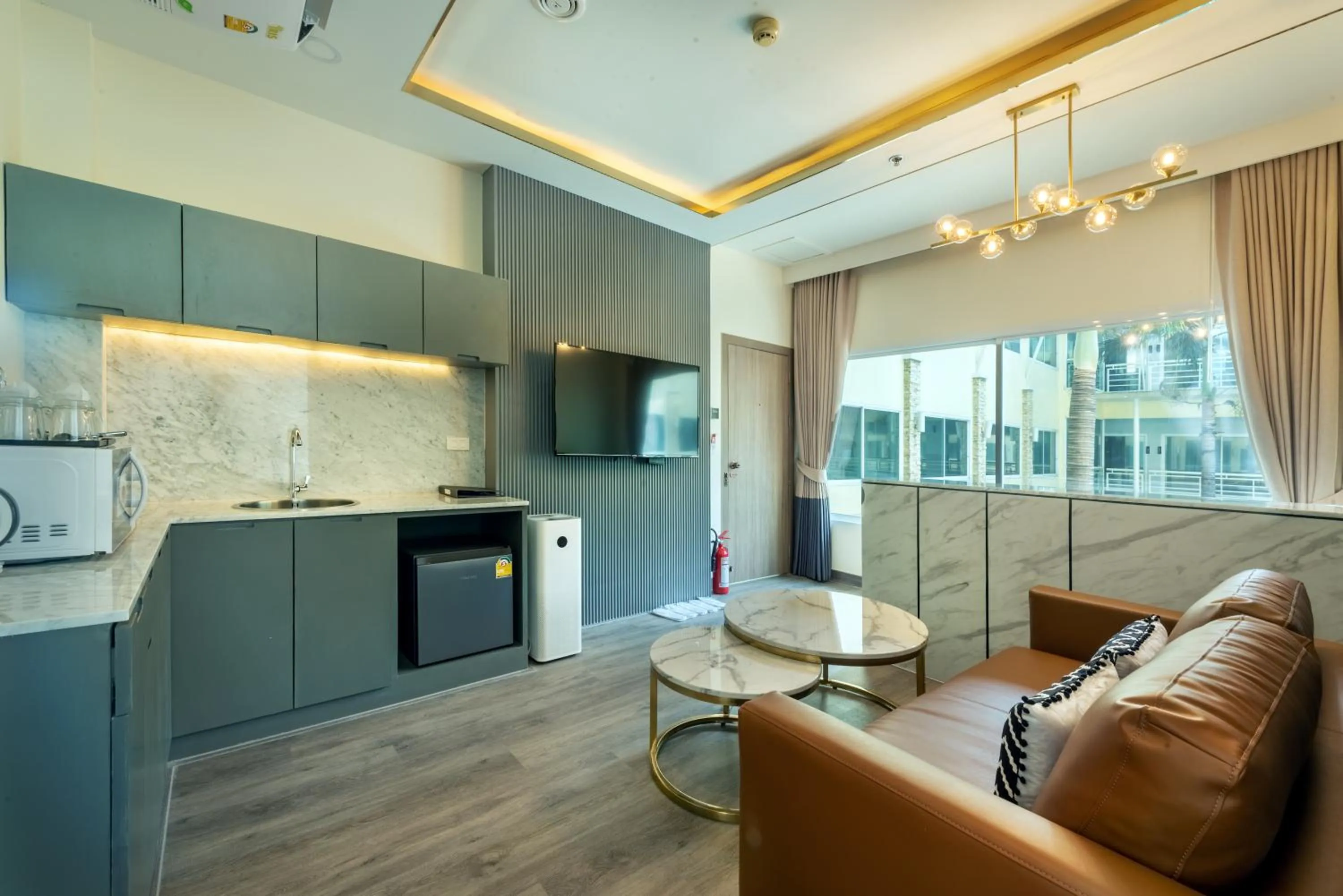 TV and multimedia in Qiu Hotel Sukhumvit - BTS On Nut Station